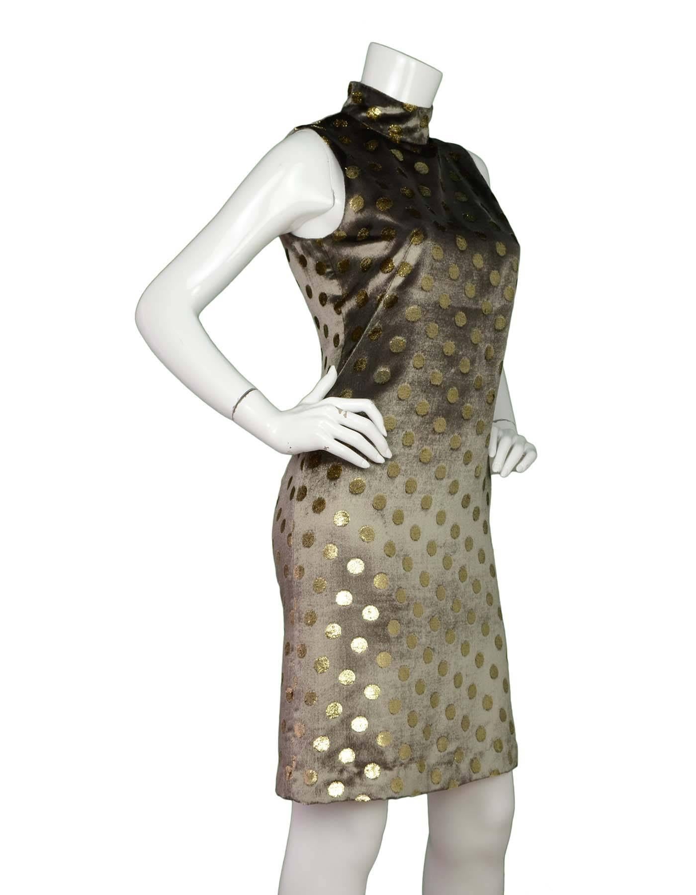 Akris Taupe Velvet Polka Dot Sleeveless Shift Dress 
Features metallic polka dots throughout and a standing collar
Made In: Romania
Color: Taupe and gold
Composition: 64% viscose, 22% silk, 14% polyester
Lining: Taupe, 100%