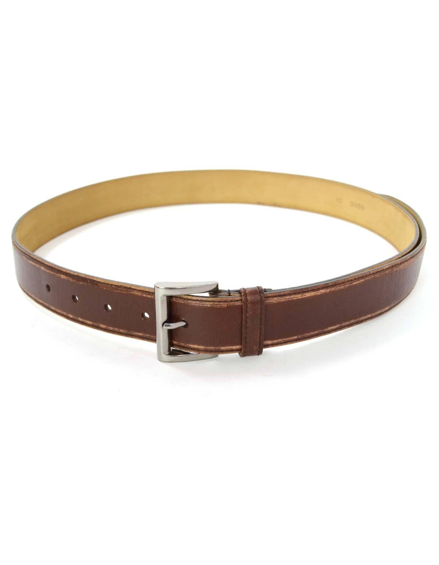 Prada Brown Distressed Leather Belt
Made In: Italy
Color: Brown
Hardware: Gunmetal
Materials: Distressed leather
Closure/Opening: Buckle and notch closure
Stamp: 1C 3889
Overall Condition: Excellent pre-owned condition
Includes: Prada dust