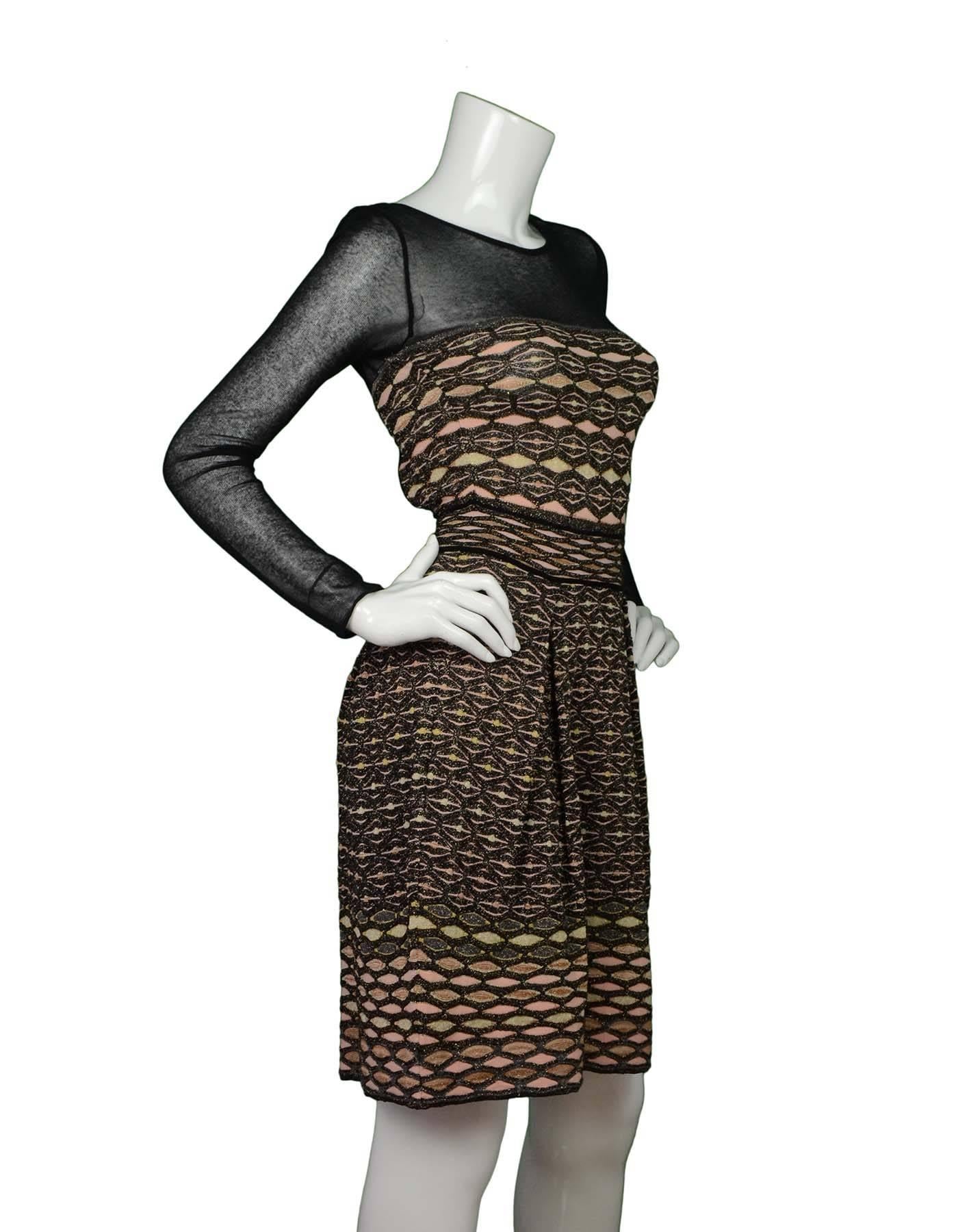 Missoni Black, Pink & Metallic Knit Dress 
Features sheer sleeves and cut out at back
Made In: Tunisia
Color: Black, pink and metallic gold
Materials: Fabric 1- 77% nylon, 12% polyester, 11% viscose, Fabric 2- 88% cotton, 12% nylon
Lining: