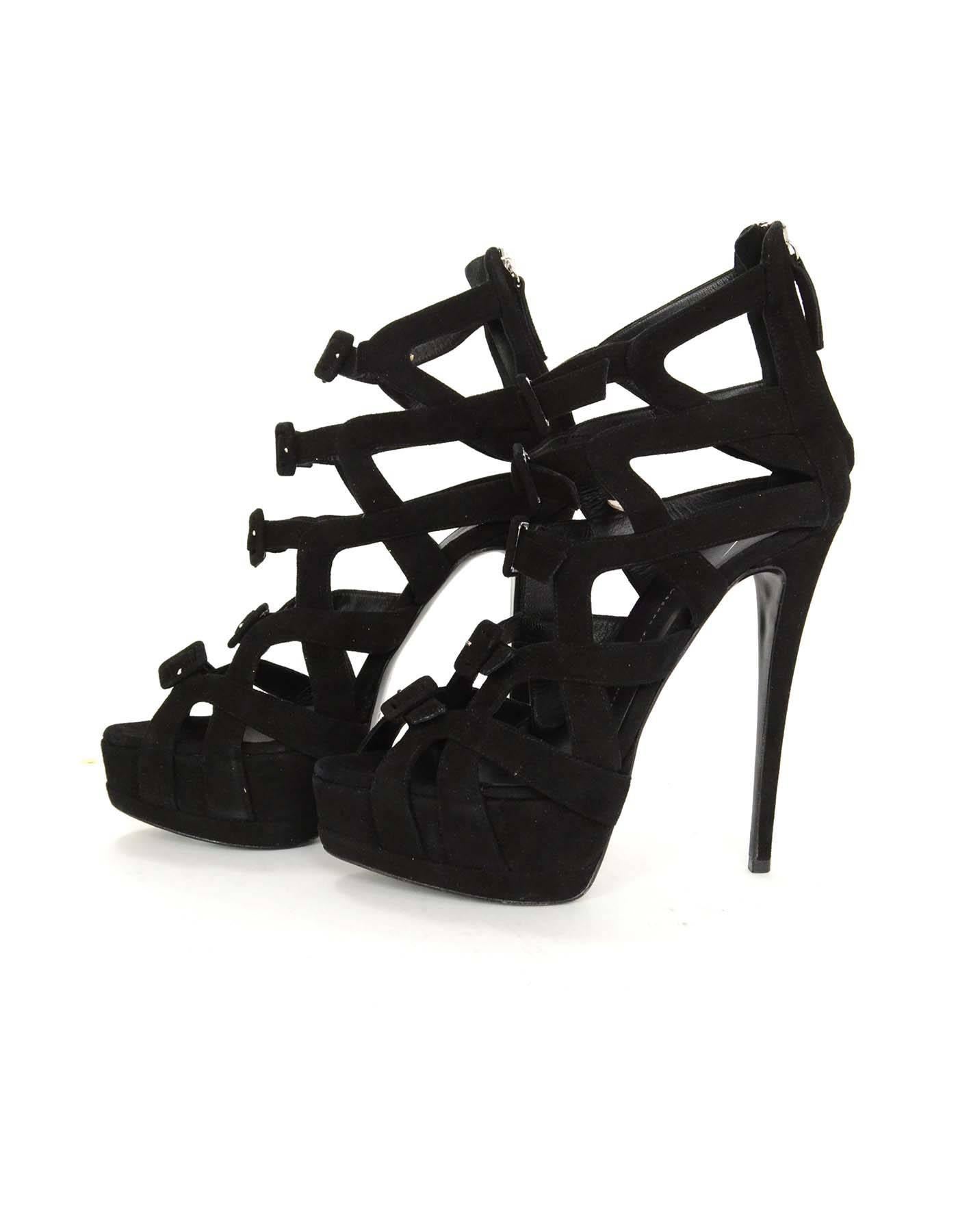 Giuseppe Zanotti Black Suede Strappy Platform Sandals 
Features buckles up front of shoe
Made In: Italy
Color: Black
Materials: Suede
Closure/Opening: Back heel zipper
Sole Stamp: Giuseppe Zanotti Vero Cuoio Made in Italy 40
Overall