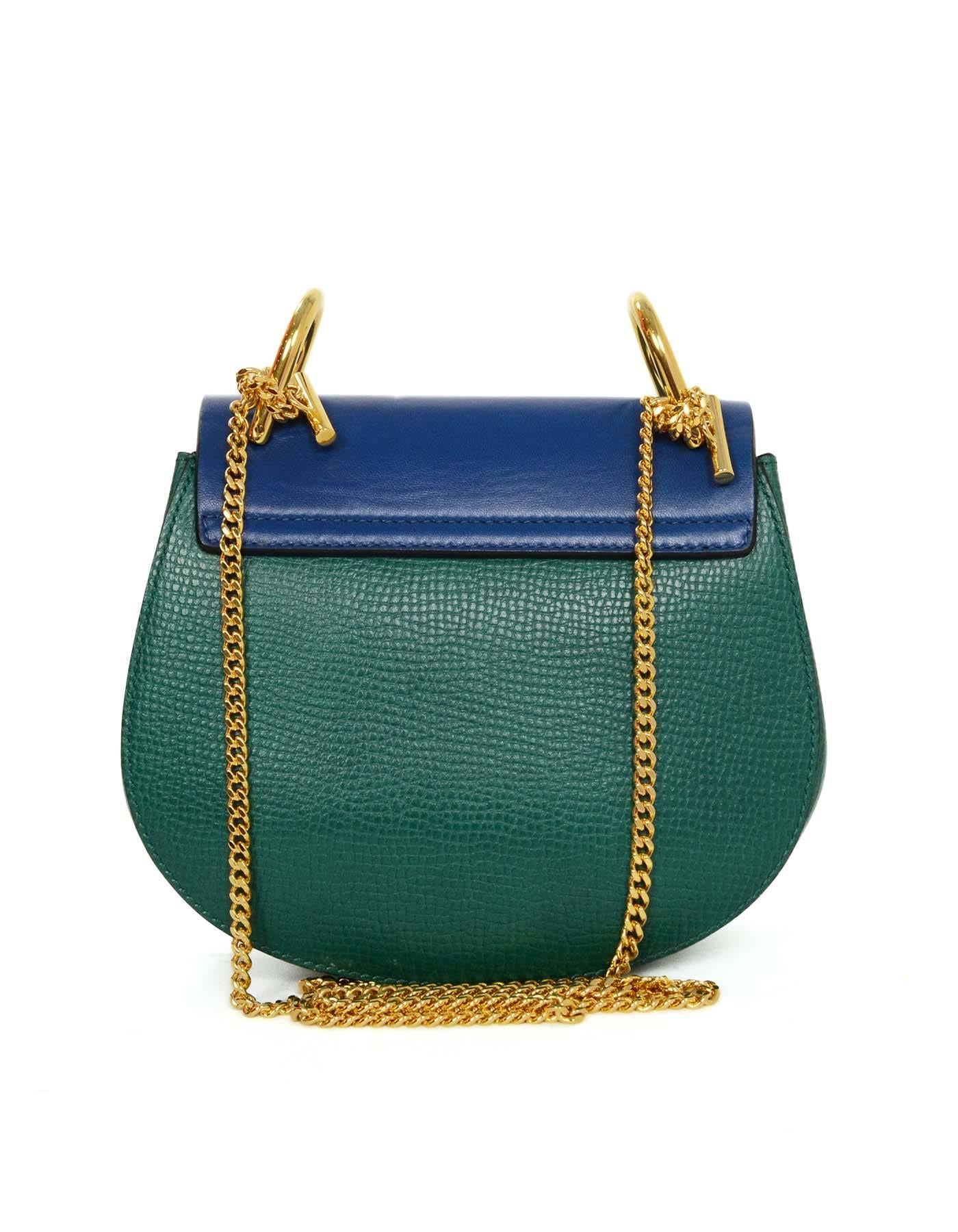 Chloe Blue and Green Bicolor Drew Small Crossbody Bag
Features blue flap with green base and goldtone twist lock closure

-Made In: Italy
-Year of Production: 2015
-Color: Blue and green
-Hardware: Goldtone
-Materials: Mix texture calfskin