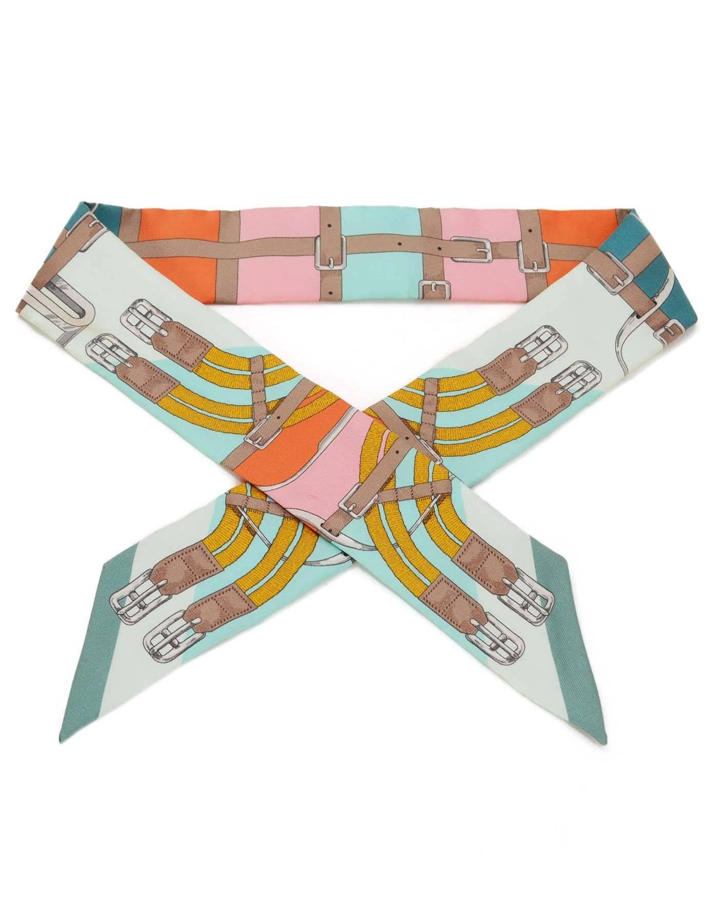 Hermes Pastel Silk Buckle Print Twilly Scarf
Features bucckle/belt print throughout

Made In: France
Color: Pastel multi-color
Composition: 100% Silk
Retail Price: $160 + tax
Overall Condition: Very good pre-owned condition with the exception