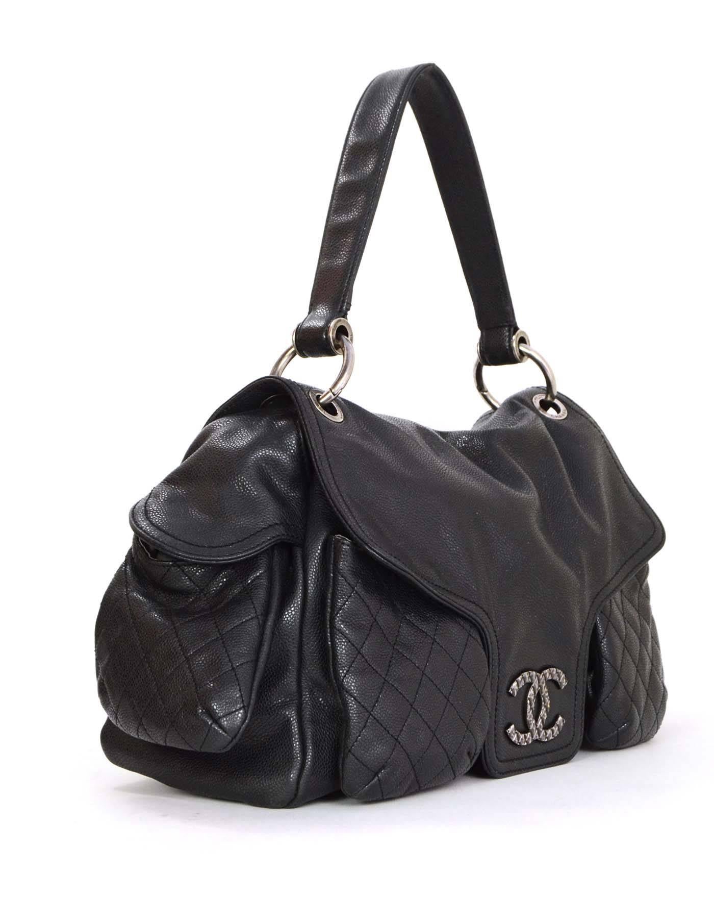 Chanel Black Caviar Rue Cambon Bag 
Features metal quilted CC at front of flap top
Made In: Italy
Year of Production: 2010
Color: Black
Hardware: Oxidized silvertone
Materials: Glazed aviar leather
Lining: Grey satin
Closure/Opening: Flap