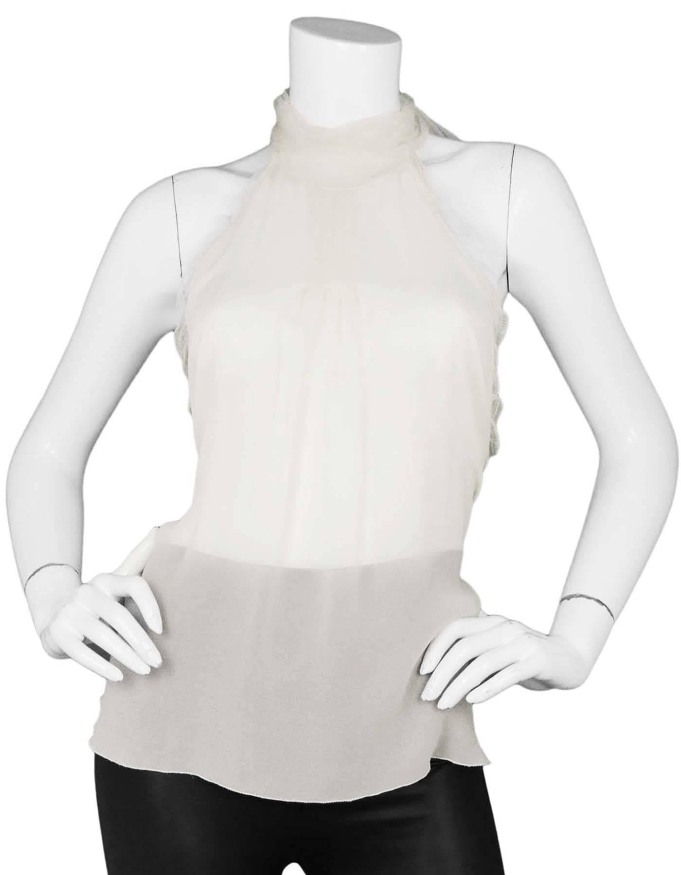 Chanel Sheer Ivory Silk Halter Top 
Features pleating at front

Made In: Italy
Year Of Production: 2005 Autumn
Color: Ivory
Composition: 100% Silk
Lining: None
Closure/Opening: Tie closure at neck and back
Overall Condition: Excellent pre-owned