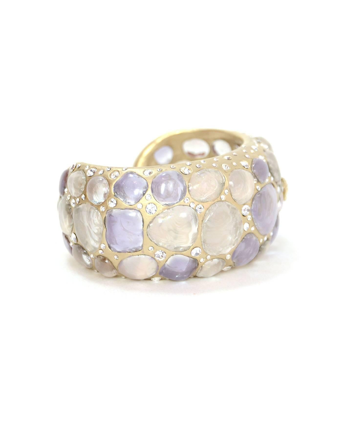 Chanel Lavender Glass & Rhinestone Silver Cuff 
Features pale goldtone CC on front

Made In: Italy
Color: Pale goldtone, purple, clear
Materials: Metal, crystal, and glass
Closure: None
Stamp: P CC
Overall Condition: Excellent pre-owned condition