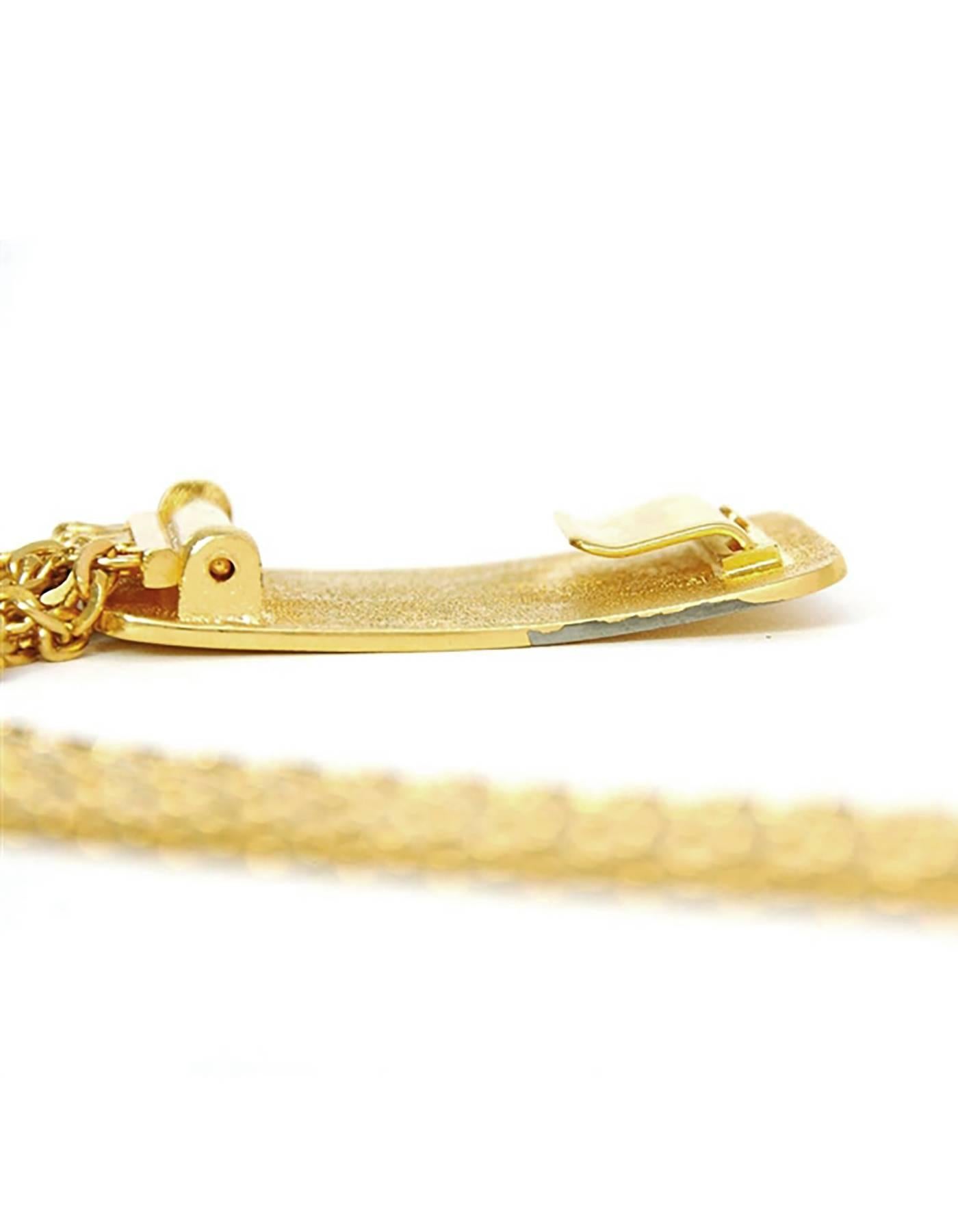 Chanel Vintage '95 Gold Chain Link Belt
Features Chanel plate as buckle

Made in: France
Year of Production: 1995
Color: Goldtone
Materials: Metal
Closure: Hook closure
Stamp: 95 CC A
Overall Condition: Good preowned condition with some peeling of