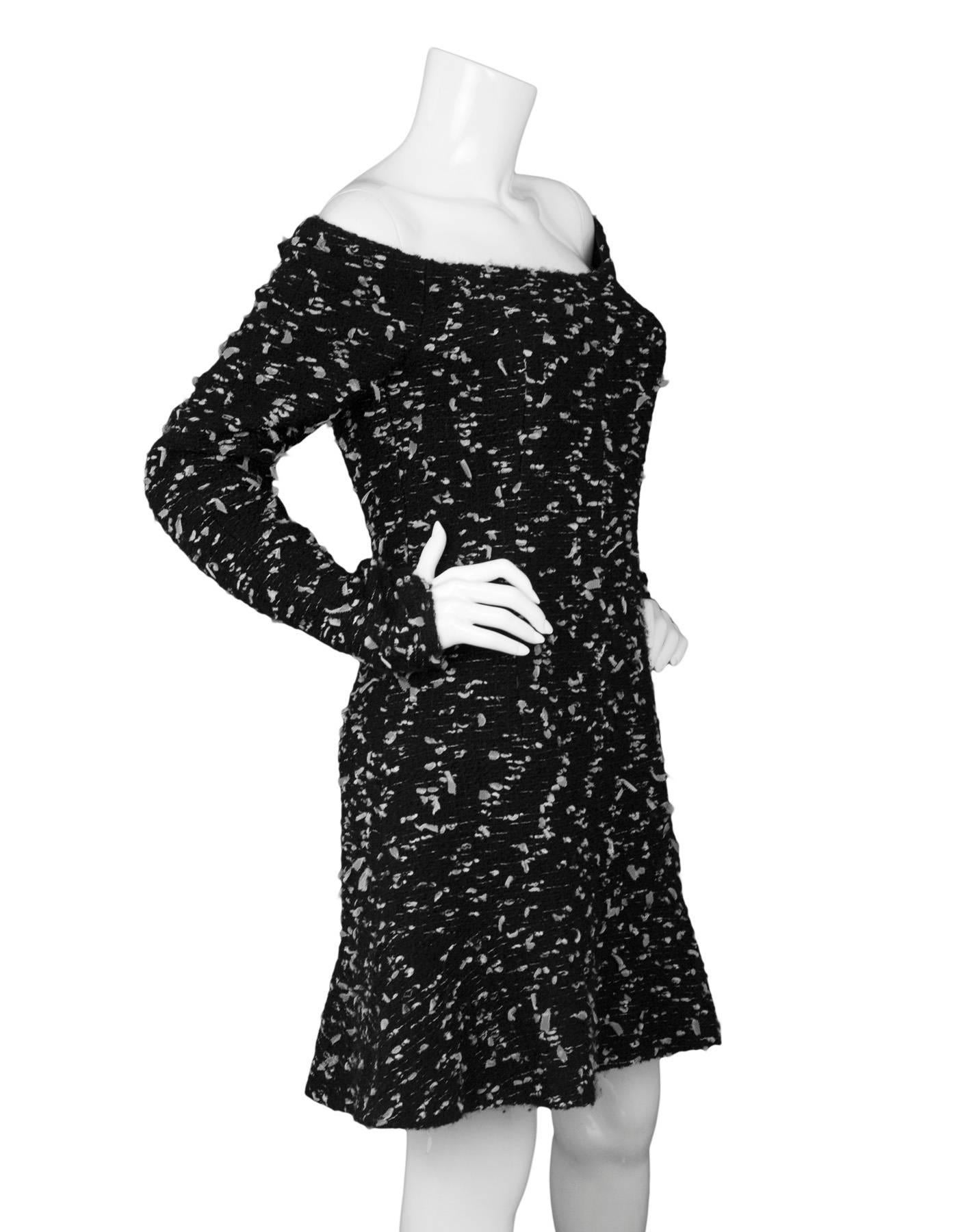 Chanel Confetti Tweed Off the Shoulder Dress

Made In: France
Year of Production: 2002
Color: Black and white
Composition: 72% wool, 8% nylon, 8% acrylic, 7% rayon, 3% polyethylene, 2% polyester
Lining: 90% silk, 10% spandex
Closure/Opening: