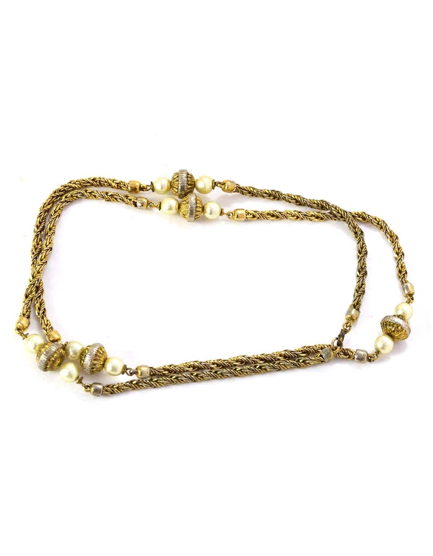 Chanel Pearl & Gold Beaded Long Chain Link Necklace 
Features faux pearls and goldtone beads

Made In: France
Year of Production: Circa 1950s-1960s
Color: Goldtone and Ivory
Materials: goldtone metal, faux pearls
Closure/Opening: 
Stamp: