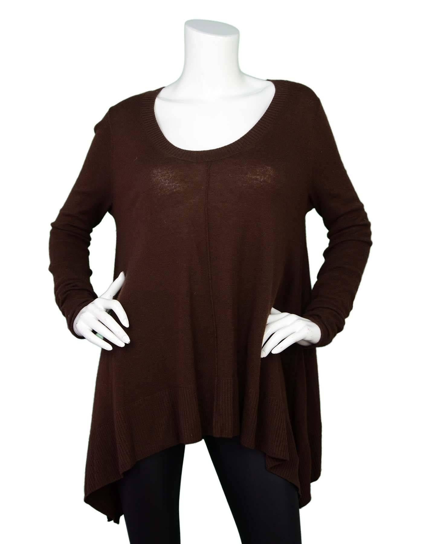 Donna Karan Brown Wool Sweater Sz S

Made In: China
Color: Brown
Composition: 70% Wool, 30% Cashmere
Lining: None
Closure/Opening: Pull-over
Overall Condition: Very good pre-owned condition with the exception of light pilling