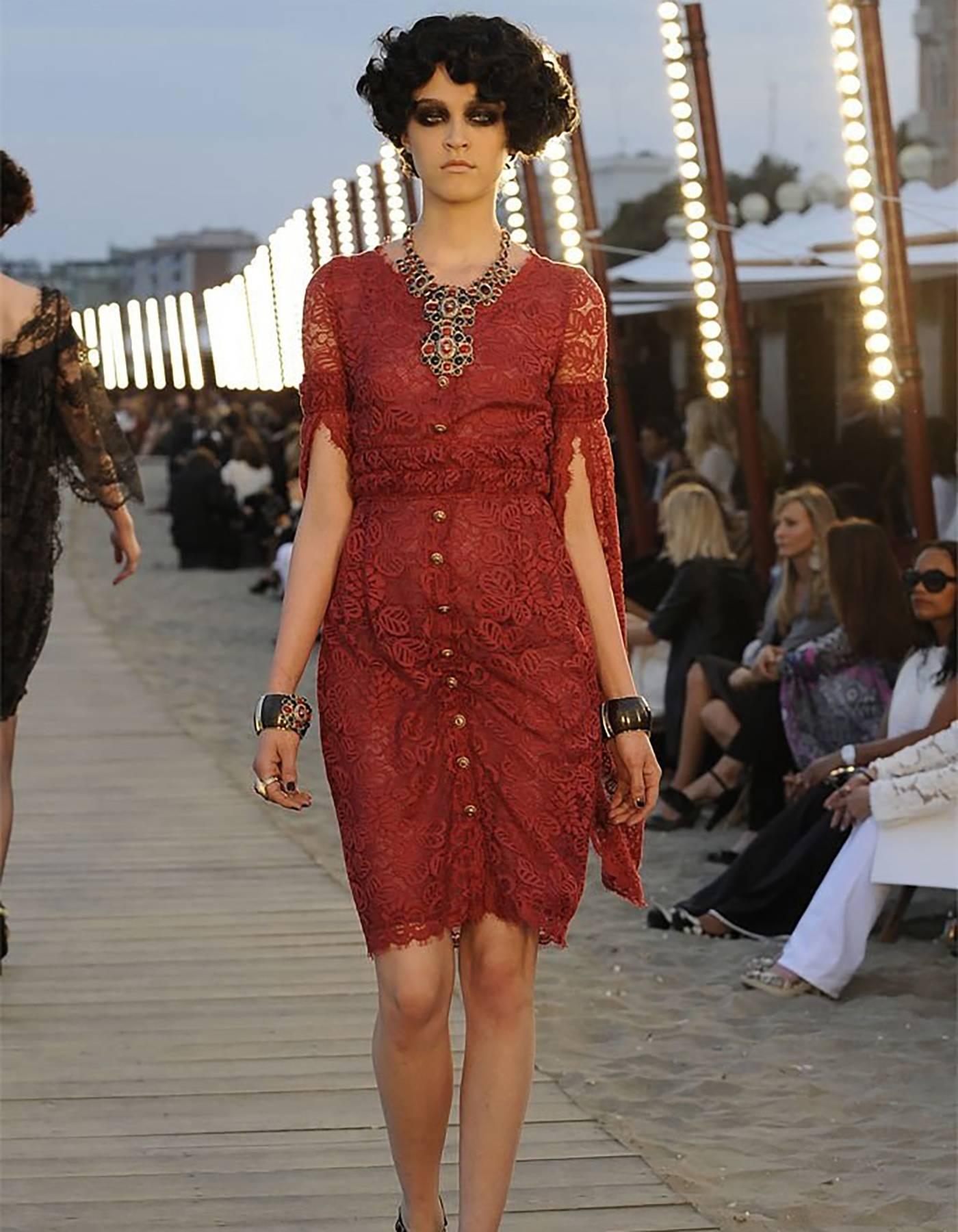 Chanel '10 Resort Runway Burgundy & Navy Bib Necklace
Features locket in center where CC pendant is with 
