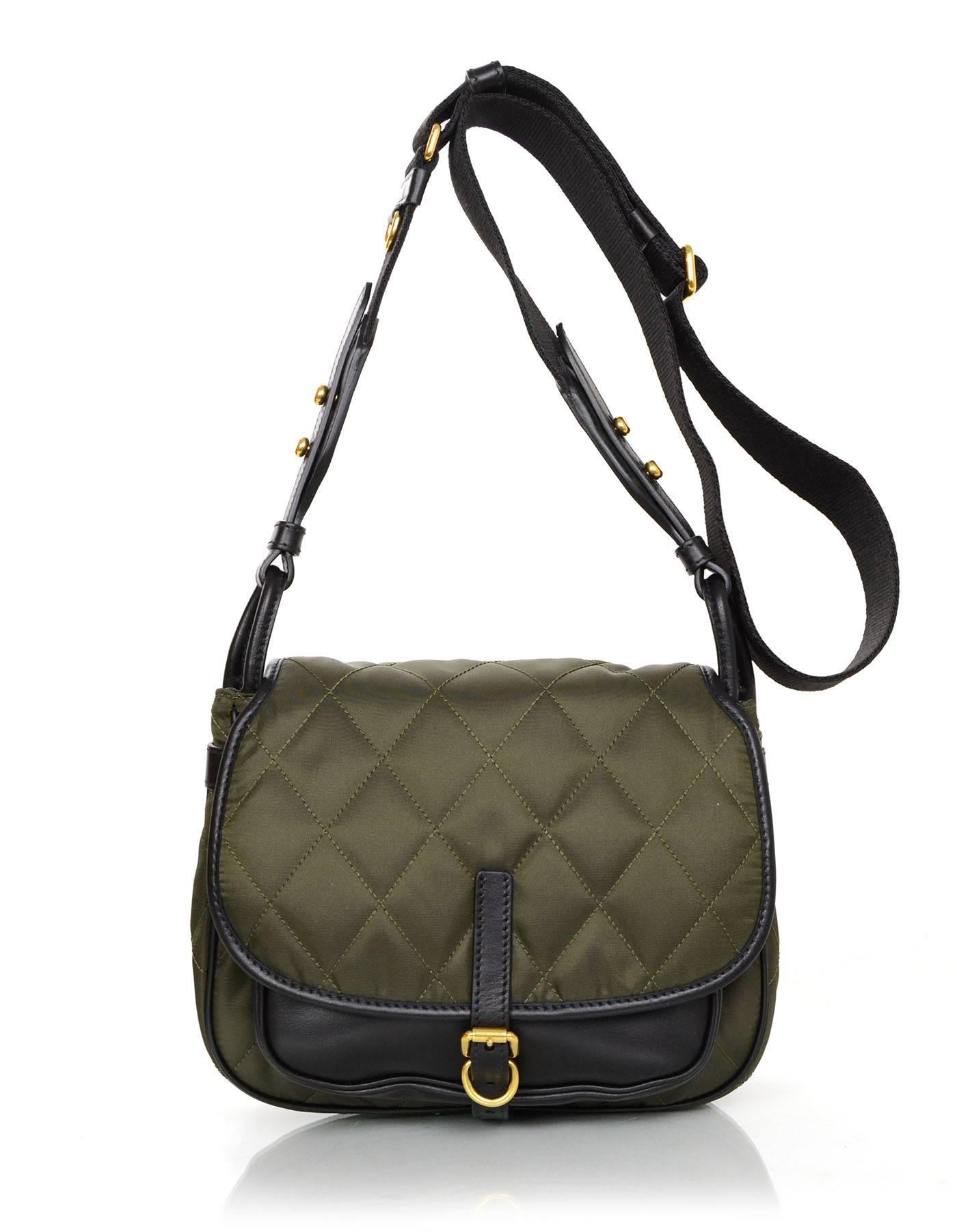 100% Authentic Prada Army Green & Black Corsaire Messenger.  Features army green quilted nylon and smooth black leather with removable goldtone O ring accents

Made In: Italy
Year of Production: 2016
Color: Army green and black
Hardware: