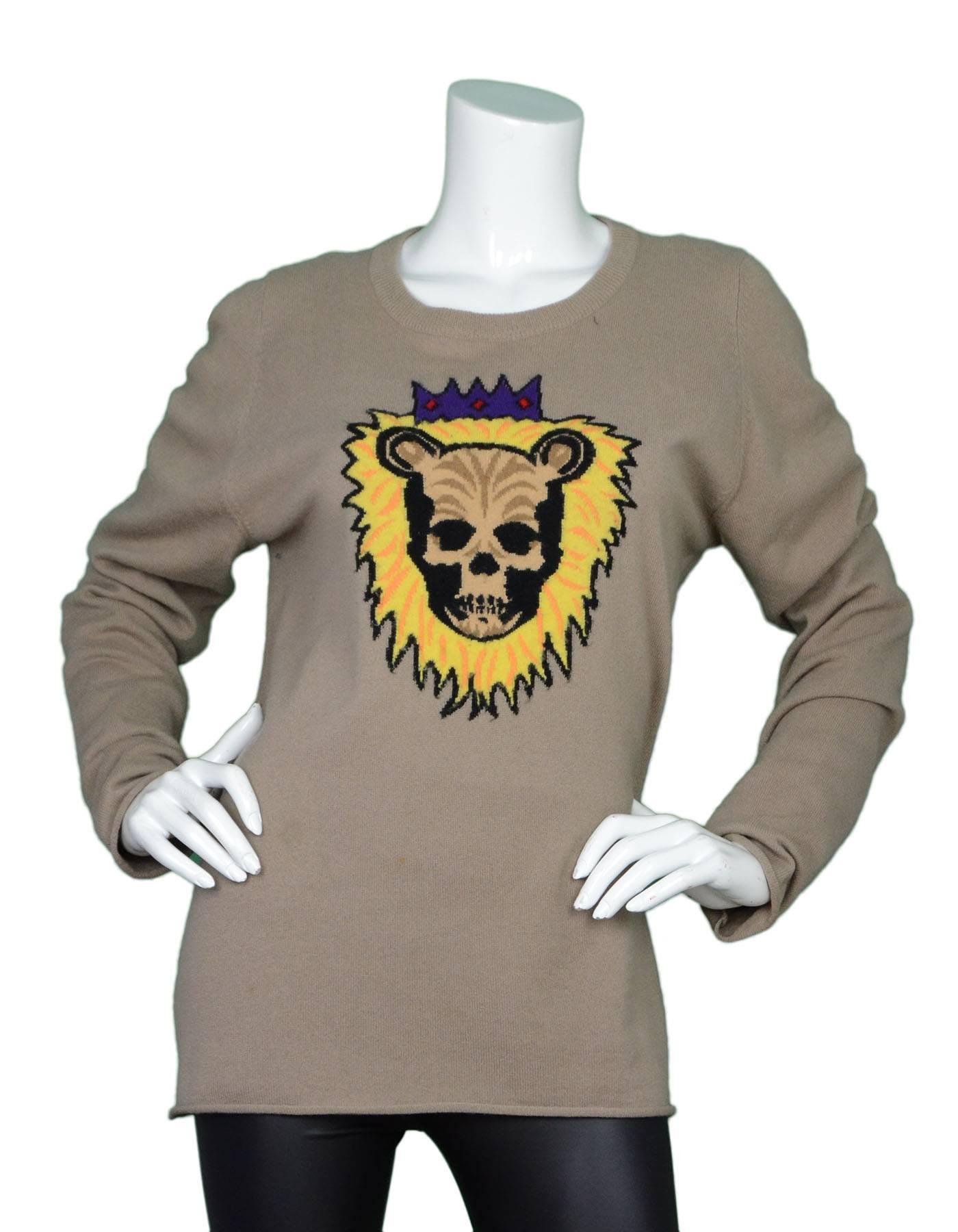 Lucien Pellat-Finet Tan Cashmere Sweater 
Features lion skull with mane printed on front
Made In: Scotland
Color: Tan and multi-colored
Composition: 100% cashmere
Lining: None
Closure/Opening: Pull over
Exterior Pockets: None
Interior