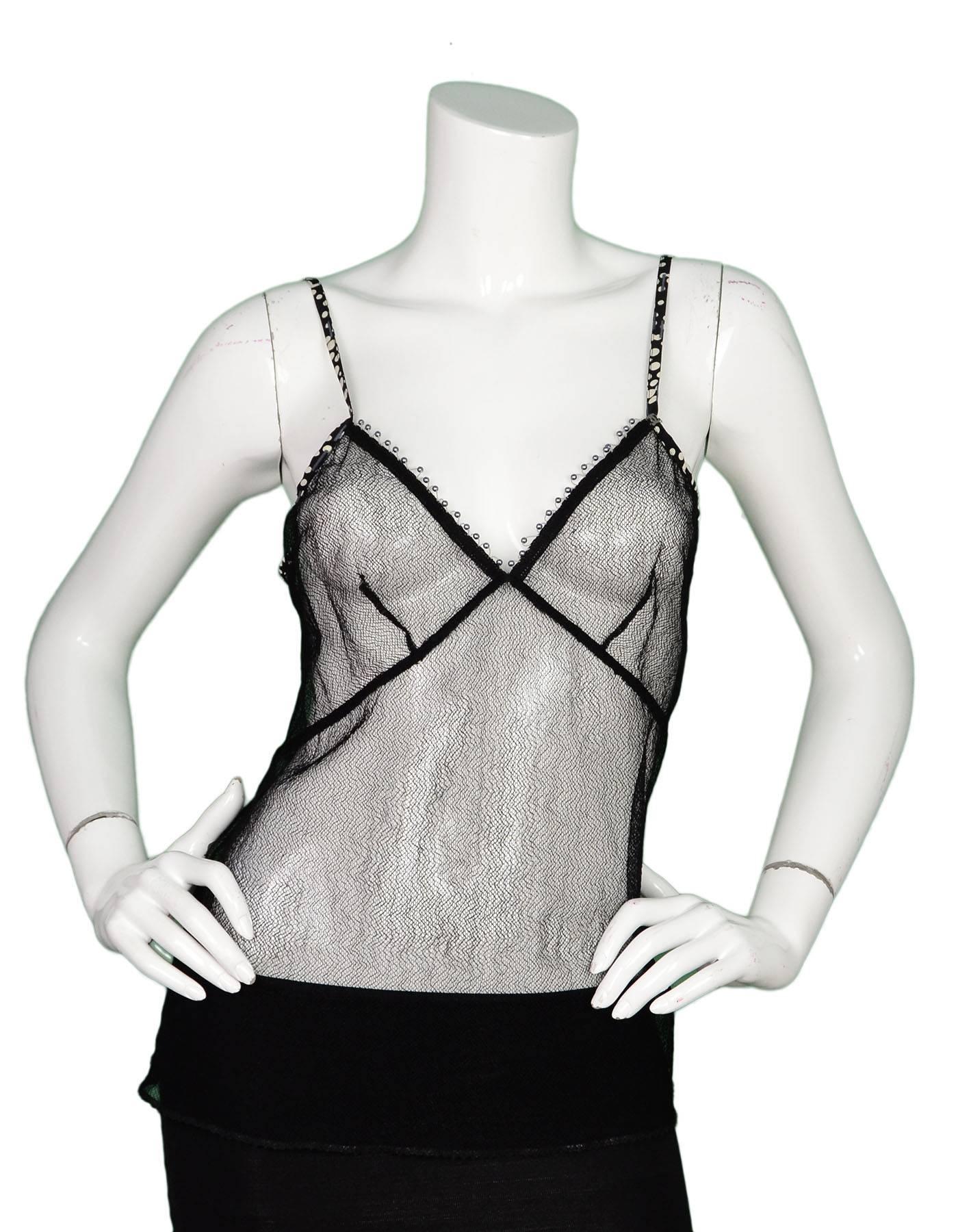 Chanel Black Mesh Camisole 
Features black and white polka-dot piping through top and straps as well as grey pearl beads throughout neckline

Made In: Italy
Year of Production: 2002
Color: Black
Composition: 90% polyamide, 10%