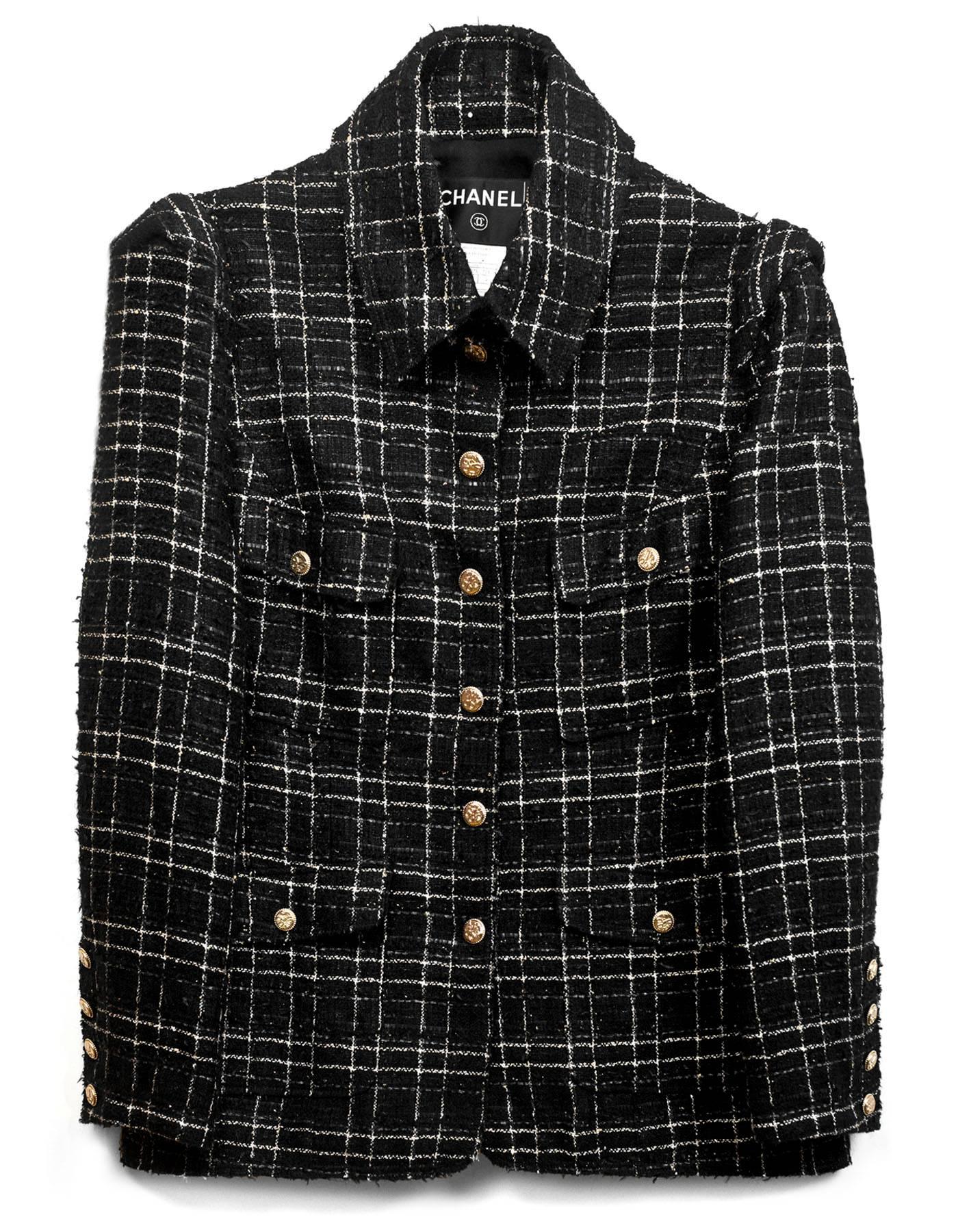 Chanel Black & White Tweed Jacket 
Features metallic stitching throughout

Made In: France
Year of Production: 2008
Color: Black and white
Composition: 35% wool, 20% acrylic, 20% rayon, 10% nylon, 5% vinyon, 5% mohair, 3% metal, 2%