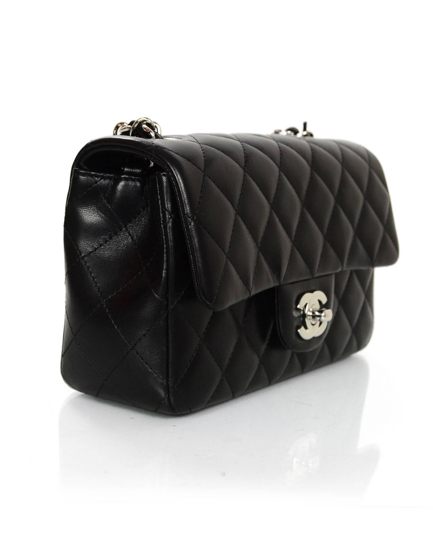 100% Authentic Chanel Black Lambskin Mini Flap Bag

Made in: Italy
Year of Production: 2015
Color: Black
Hardware: Silvertone
Materials: Leather, metal
Lining: Black leather
Closure/opening: Flap top with CC twist lock closure
Exterior