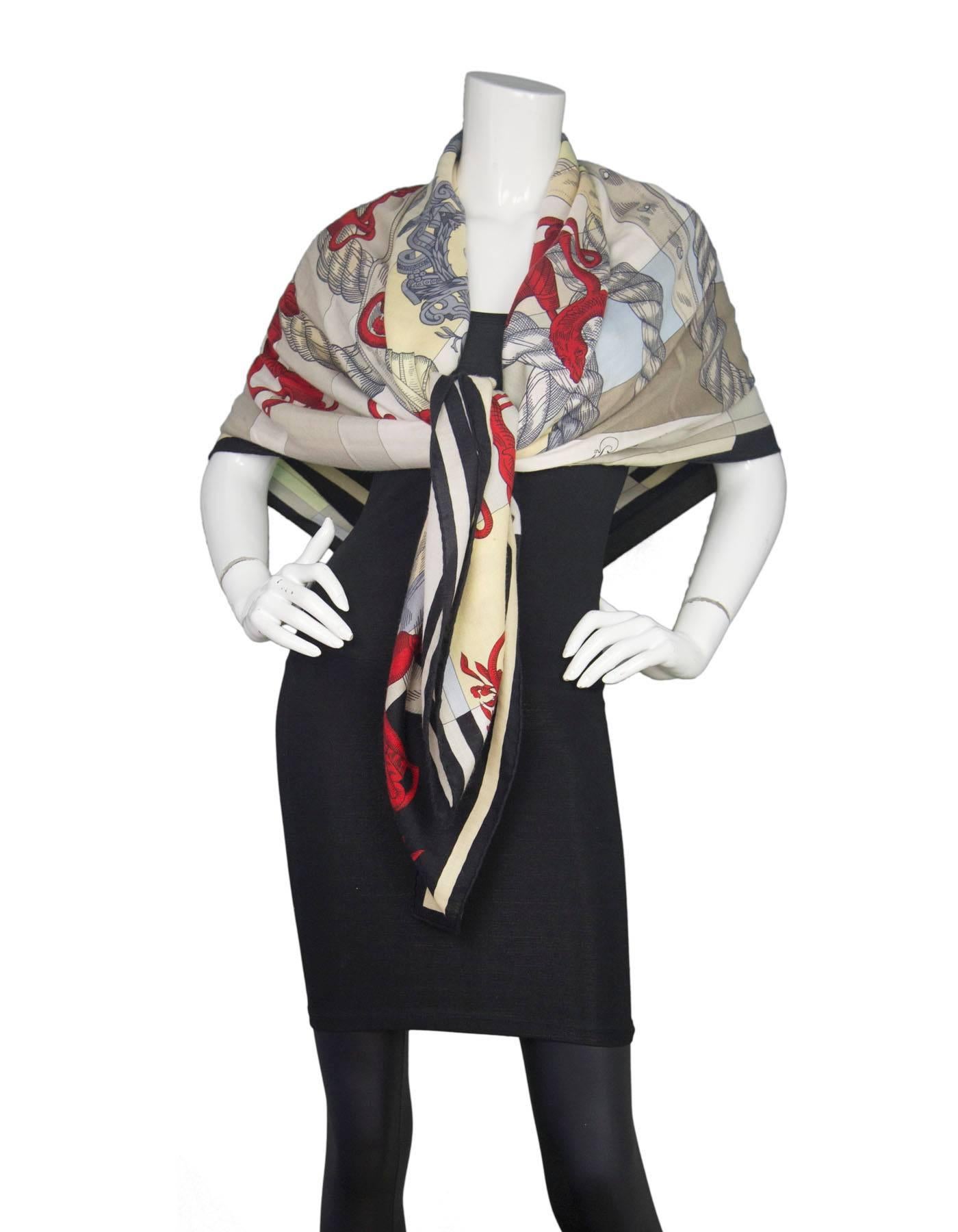 100% Authentic Hermes Della Cavalleria Scarf 140 cm. Features nautical motiff in red and taupe with a black border. Made from silk and cashmere. Excellent condition, comes with original box. 

Made In: France
Color: Red, taupe and black
Composition: