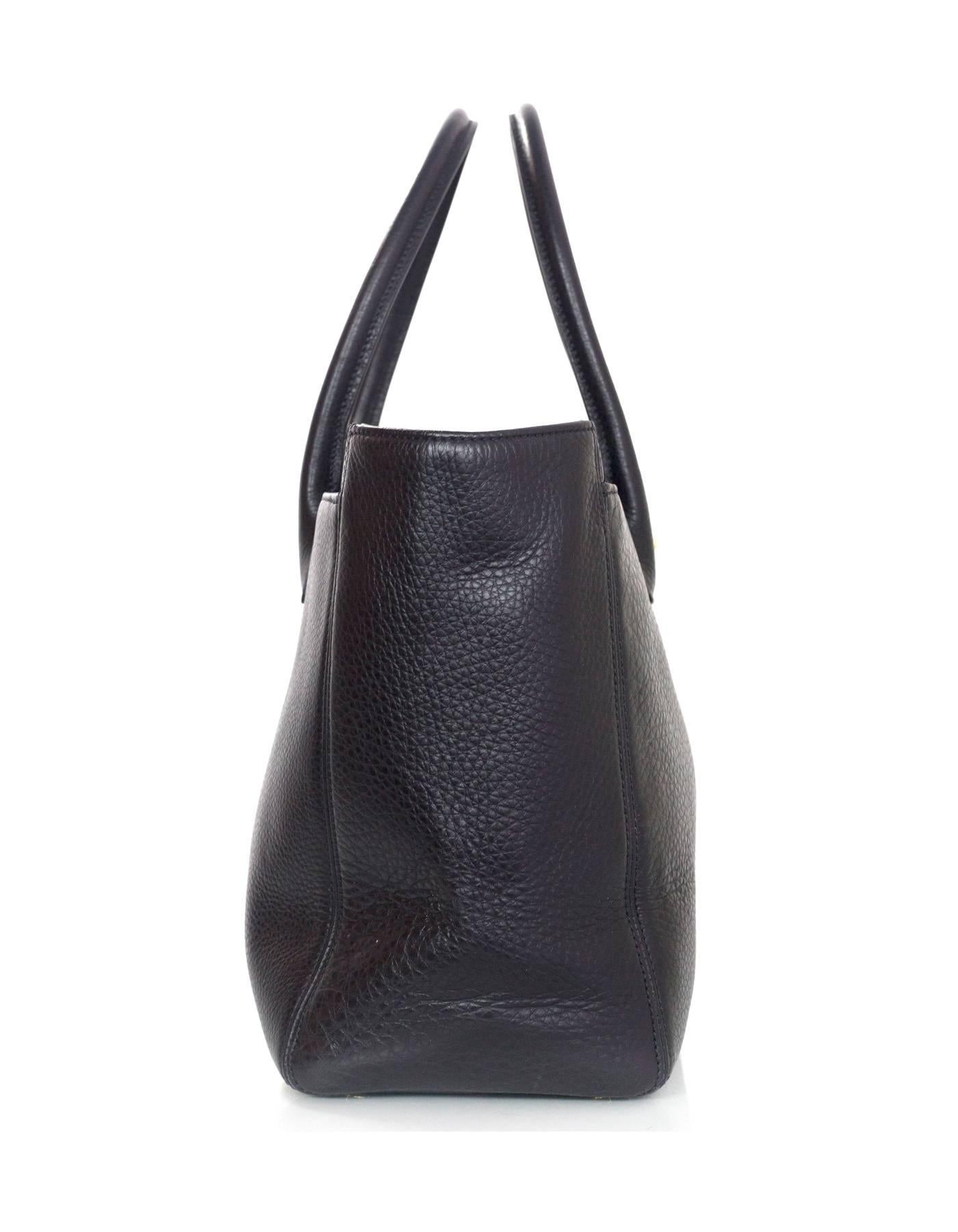 Chanel Black Leather XL Cerf Tote 

**Please note that the removable insert and strap are both missing**

Made In: Italy
Year of Production: 2015
Color: Black
Hardware: Goldtone
Materials: Leather
Lining: Black grosgrain
Closure/Opening: Open top