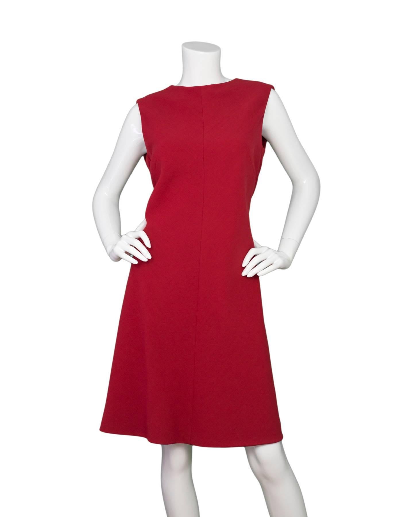 Giorgio Armani Red Wool Dress Sz IT46 NWT

Features pleating detail at back of skirt

Made In: Italy
Color: Red
Composition: 100% Wool
Lining: Red silk
Closure/Opening: Back zip closure
Retail Price: $2,295 + tax
Overall Condition: Excellent