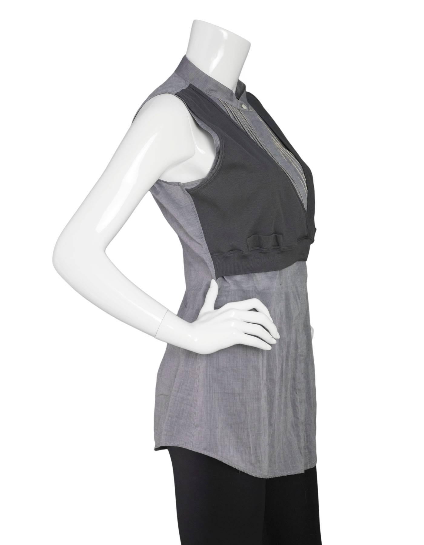 Brunello Cucinelli Cotton Zipper Sleeveless Top 
Features ribbed vest-like detail over top at front panel

Made In: USA
Color: Grey
Composition: 94% cotton, 6% lycra
Lining: None
Closure/Opening: Button down front
Exterior Pockets: None
Interior