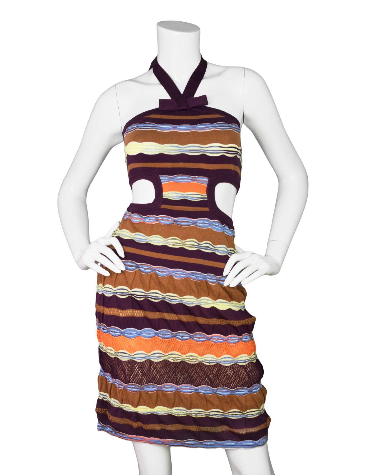 M Missoni Multi-Colored Knit Halter Neck Cut Out Dress 
Features nude skirt slip  and cut outs at waistline

Made In: Italy
Color: Burgundy, tan, orange, white, yellow and light blue
Composition: Not given- believed to be a cotton or