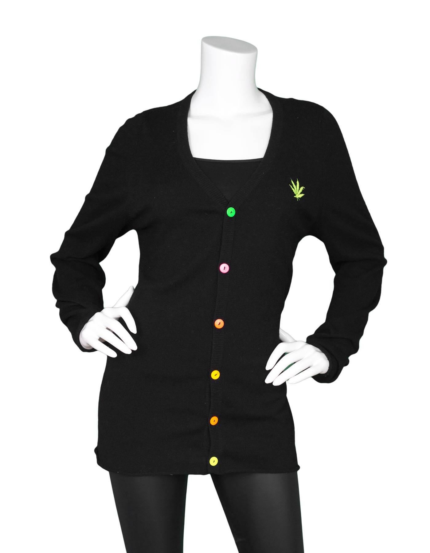 Lucien Pellat-Finet Black Cashmere Cardigan
Features multi-colored neon buttons and neon green leaf embroidery

Made In: Scotland
Color: Black
Composition: 100% Cashmere
Lining: None
Closure/Opening: Button down front
Exterior Pockets: None
Interior