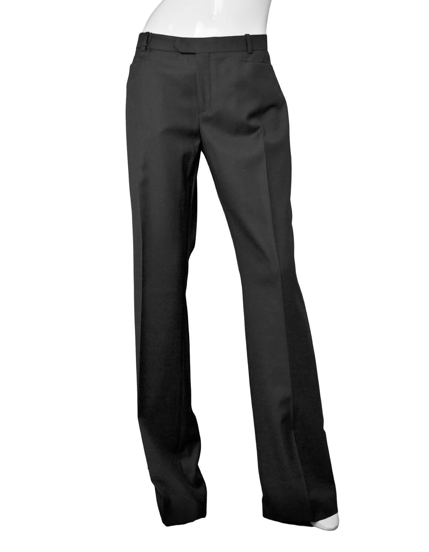 Joseph Black Wool Pants Sz IT42 NWT
Bootcut pant in Rockstar Super 100 fit

Made In: Romania
Color: Black
Composition: 100% Wool
Lining: None
Closure/Opening: Front zip and double hook closure
Exterior Pockets: Two back pockets and two slit pockets