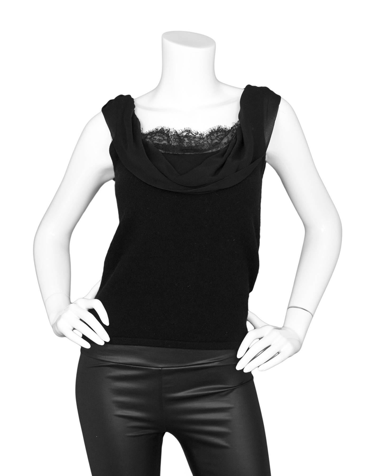 Ralph Lauren Black Cashmere Sleeveless Top
Features black silk and lace details at neckline

Made In: China
Color: Black
Composition: 88% cashmere, 11% nylon, 1% elastane
Lining: None
Closure/Opening: Pull over
Exterior Pockets: None
Interior