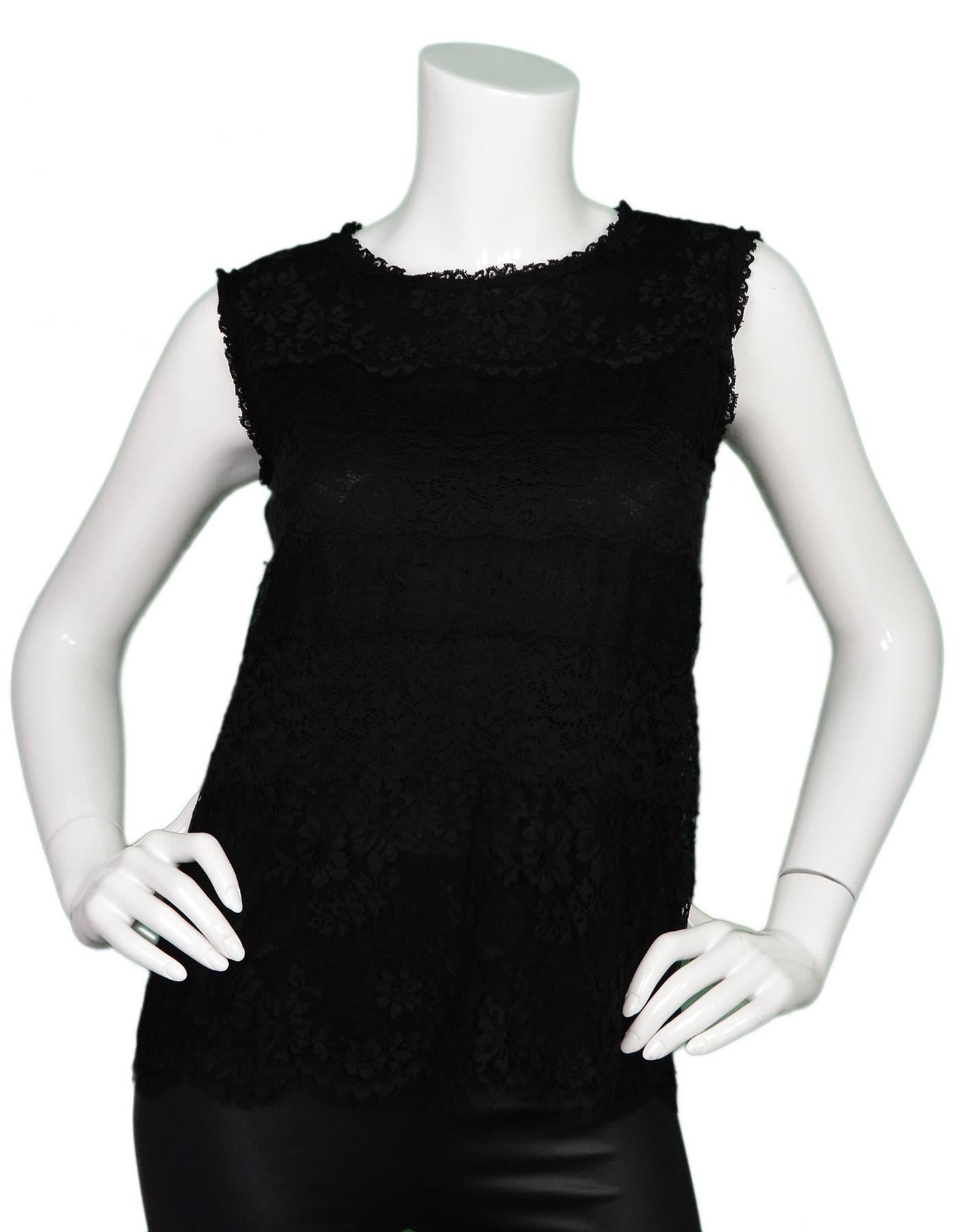 Dolce & Gabbana Black Lace Sleeveless Top 
Features black modal underlay

Made In: Italy
Color: Black 
Composition: 70% cotton, 20% nylon, 10% viscose
Lining: Black, 100% modal
Closure/Opening: Pull over with back neck button closure
Exterior