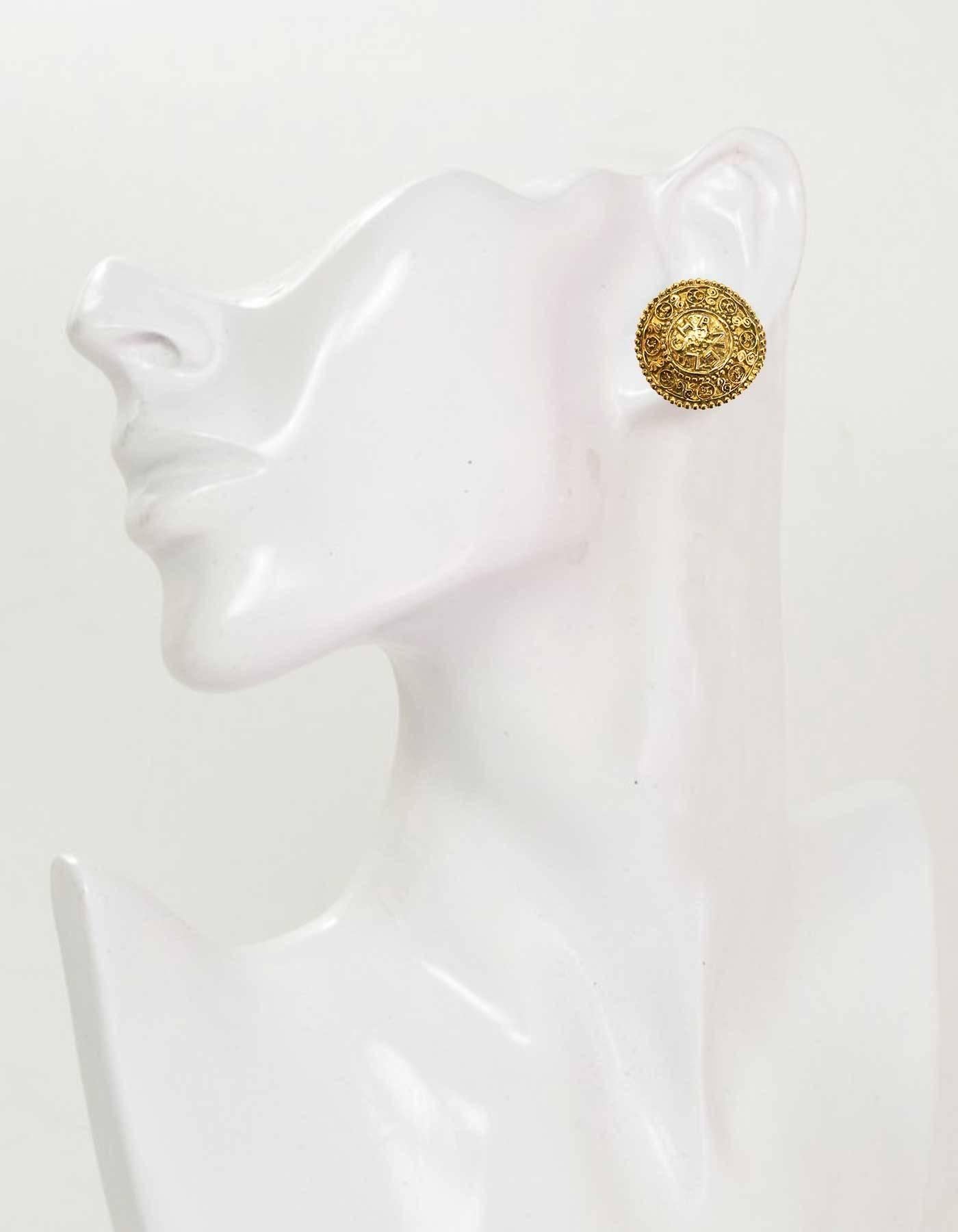 Chanel Vintage Medallion Clip-On Earrings

Made In: France
Year Of Production: Early 1990's
Color: Goldtone
Materials: Metal
Closure: Clip on
Stamp: Chanel C C Made in France
Overall Condition: Excellent vintage, pre-owned condition with minor