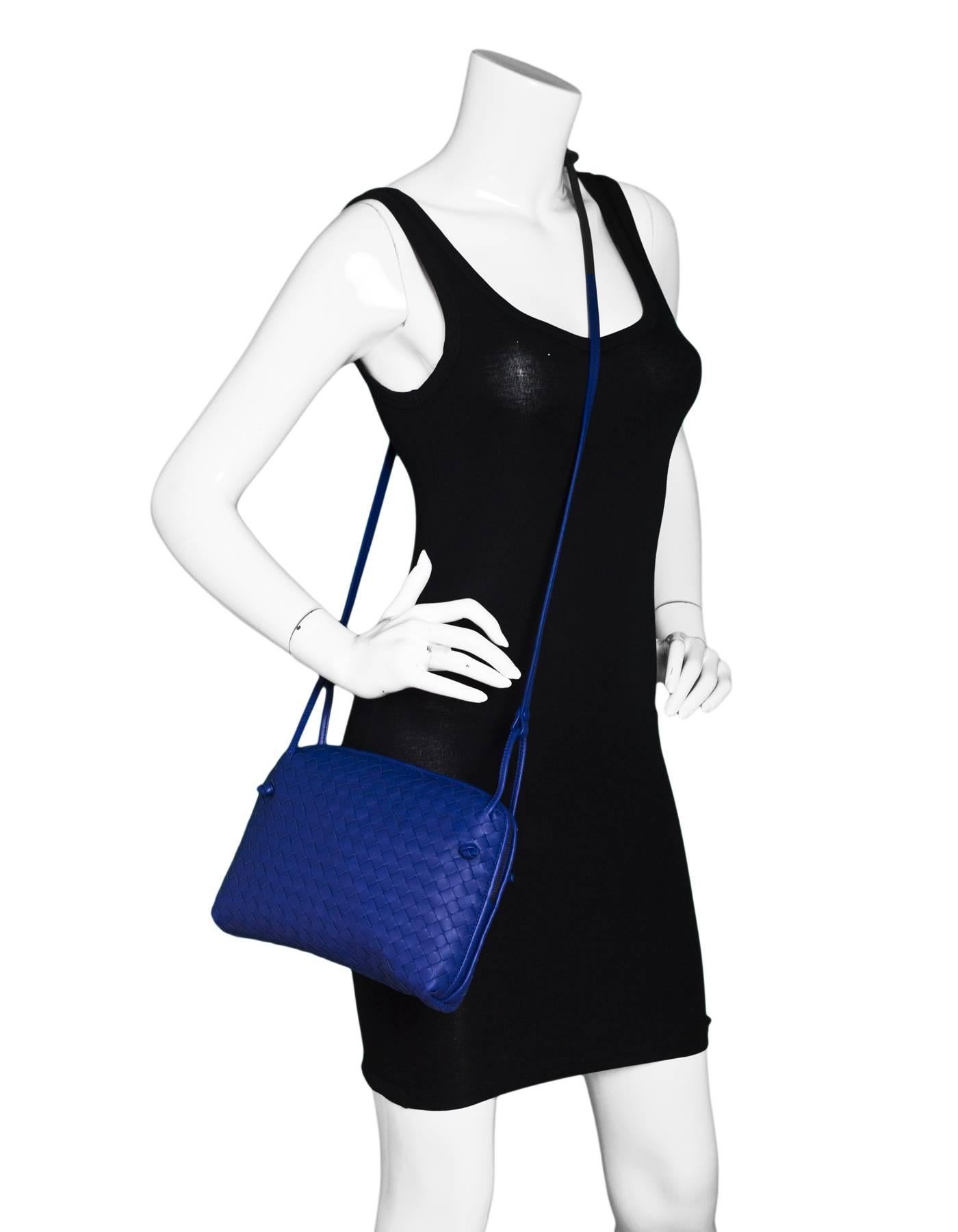 Bottega Veneta Cobalt Blue Intrecciato Leather Nodini Crossbody

Made In: Italy
Color: Coablt blue
Hardware: Dark grey
Materials: Leather, metal
Lining: Taupe suede
Closure/Opening: Double zip top closure
Exterior Pockets: None
Interior Pockets: Zip