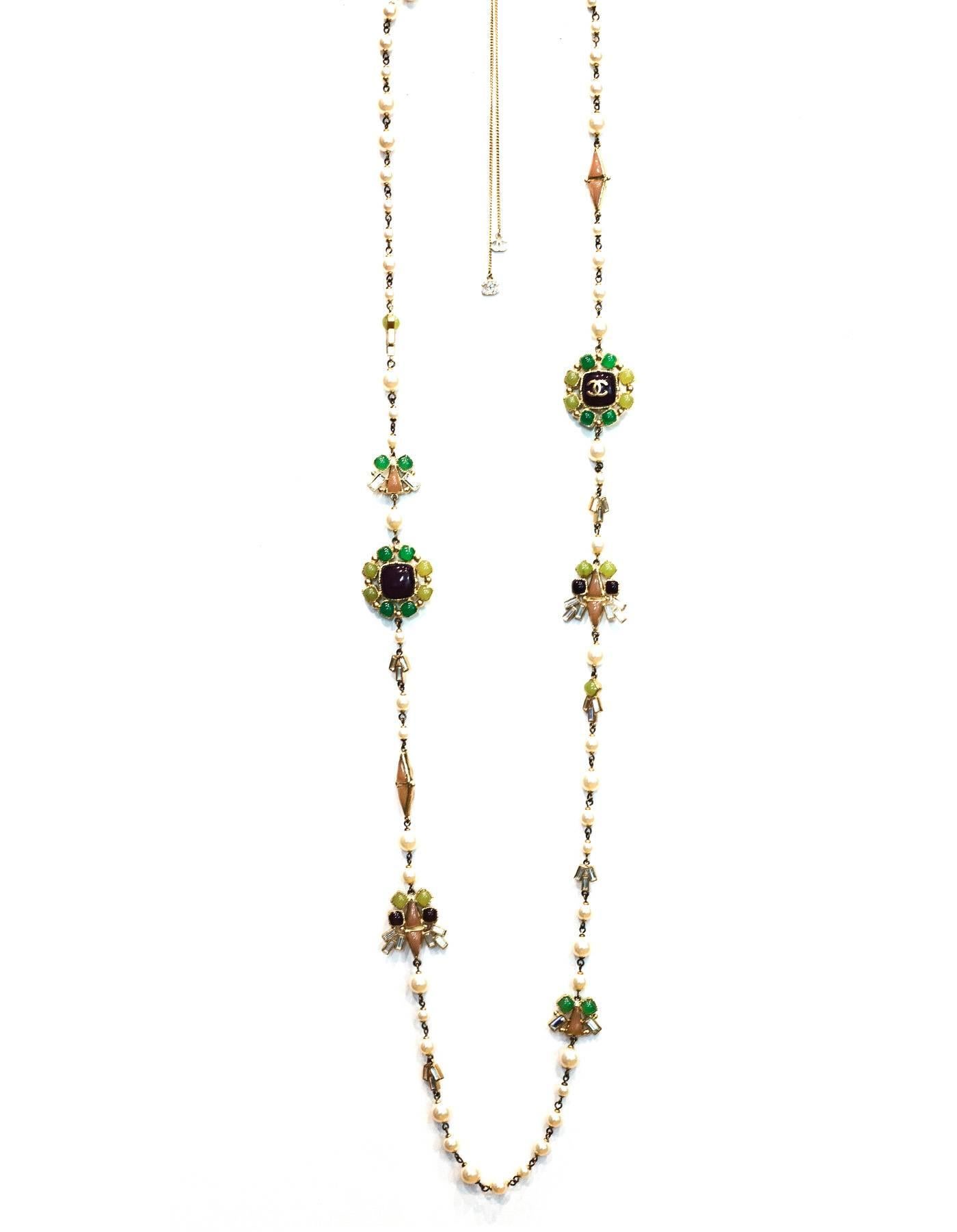 Chanel Pearl & Multi-Colored Glass Bead Long Necklace

Made In: France
Year of Production: 2009
Color: Silvertone, ivory, mauve, green and pink
Materials: Metal, poured glass and faux pearls
Closure: Lobster claw clasp
Stamp: P CC
Overall Condition: