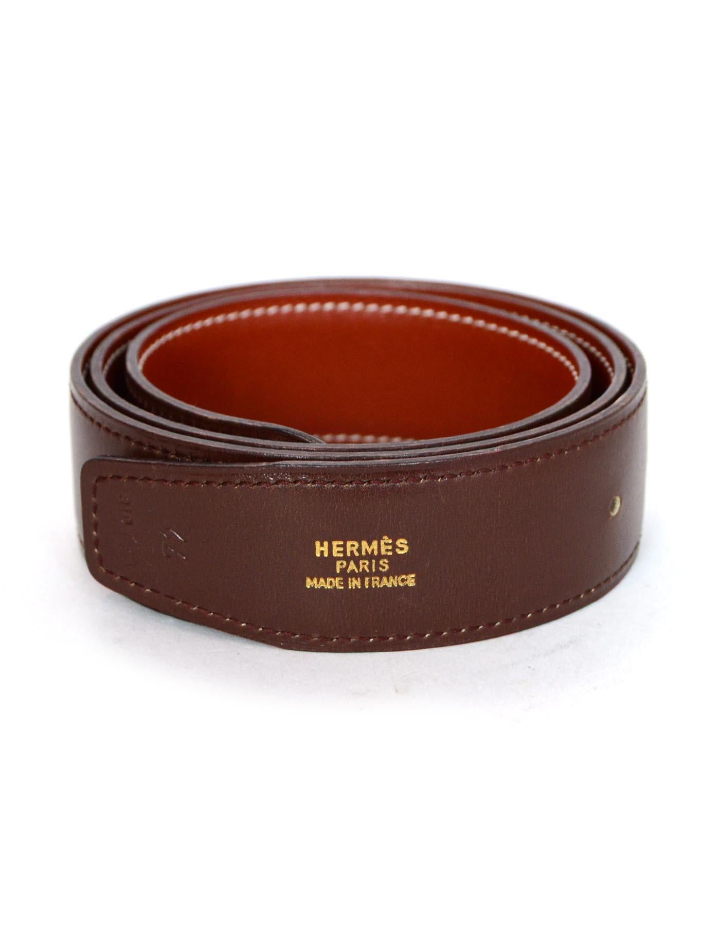 Hermes Brown/Rust Reversible Leather 32mm Belt Strap 72

Made In: France
Year Of Production: 1996 (Z in circle marking on belt)
Color: Brown and rust (on reverse side)
Hardware: No buckle included
Materials: Smooth leather
Closure/Opening: No buckle