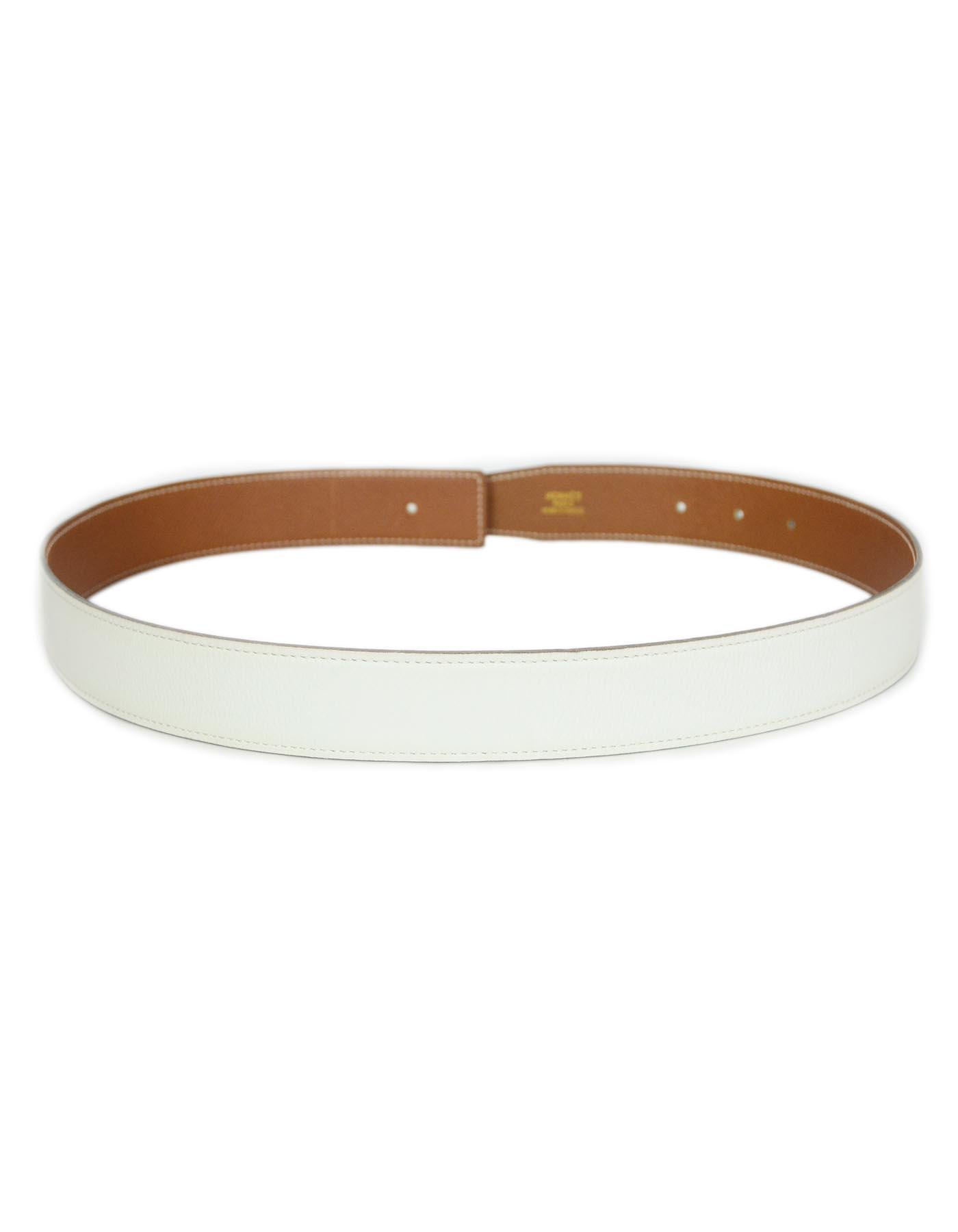 Hermes White/Tan Gold Leather Reversible 32mm Belt Strap 72

Made In: France
Year Of Production: 1998 (B in square marking on belt)
Color: White and tan gold (on reverse side)
Hardware: No belt buckle included 
Materials: Textured