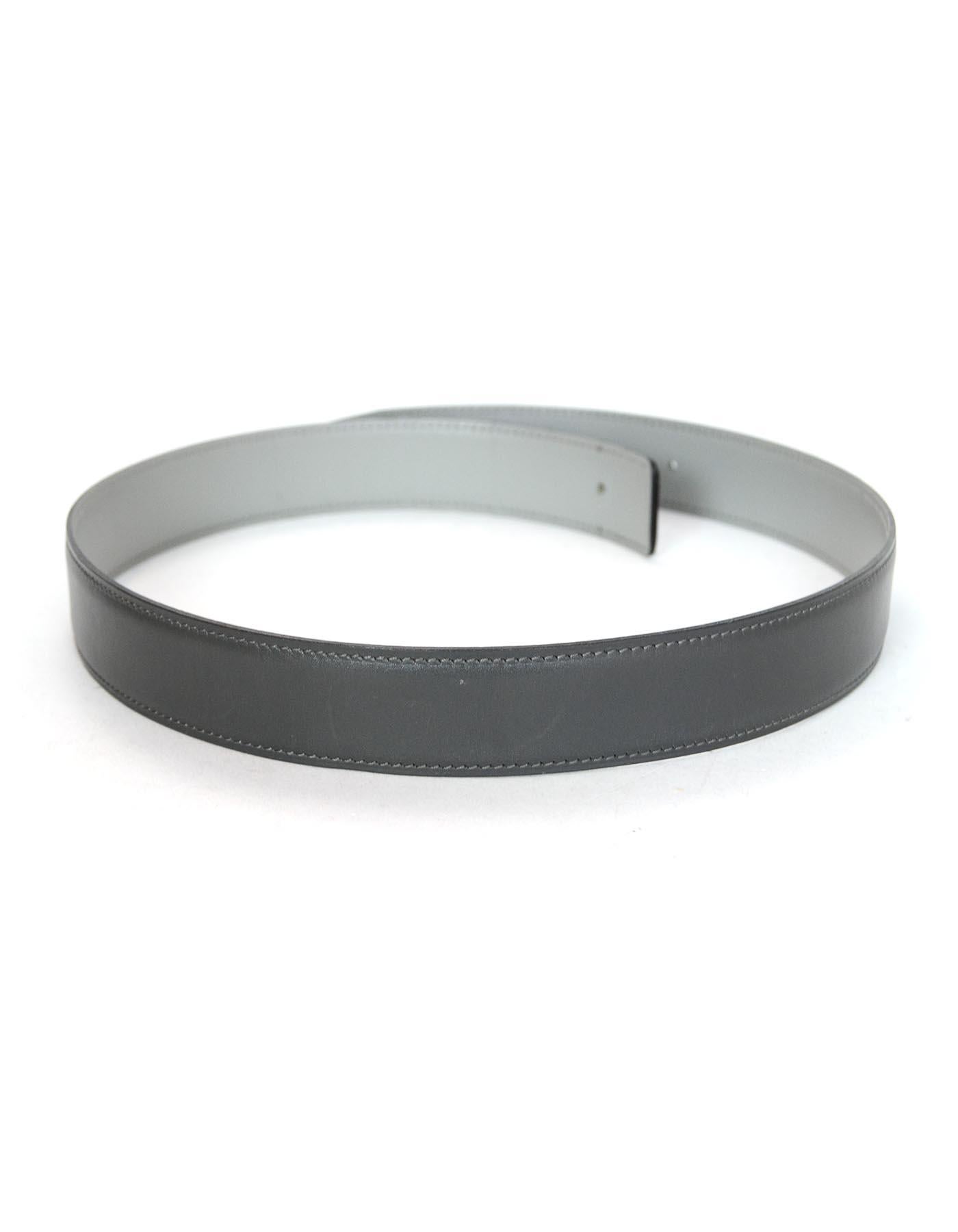 Hermes Grey Reversible Leather 32mm Belt Strap 72

Made In: France
Year Of Production: 1999 (C in a square marking on belt)
Color: Light and dark grey
Hardware: No belt buckle included 
Materials: Smooth leather 
Closure/Opening: No belt buckle