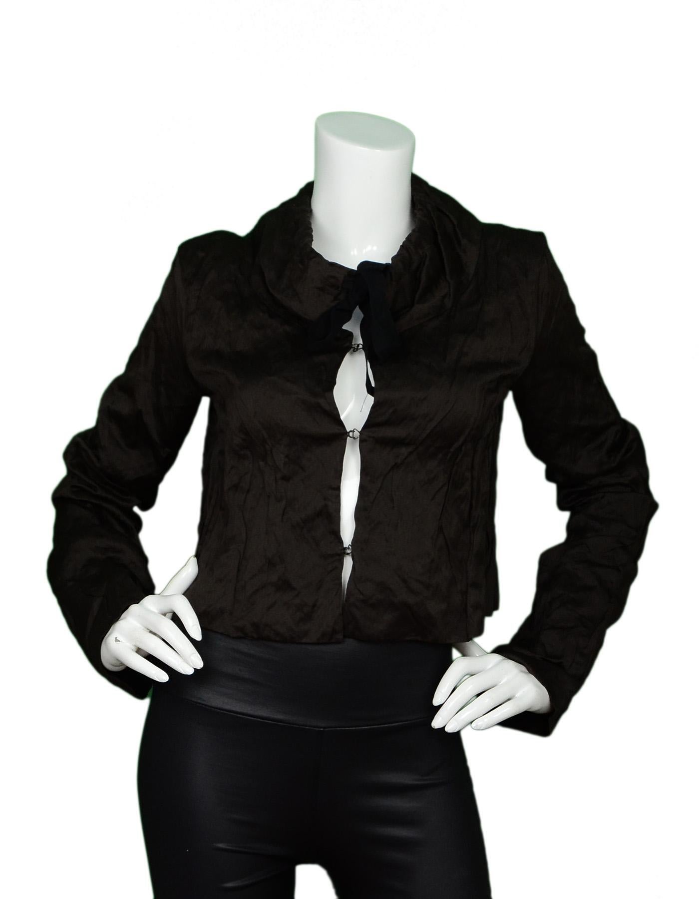 Prada Brown Crinkled Cropped Jacket W/ Drawstring Neck Sz 38

Made In: Italy
Color: Brown
Materials: 76% cotton, 24% metal
Opening/Closure: Hook eye front and drawstring collar
Overall Condition: Excellent pre-owned condition 

Measurements: