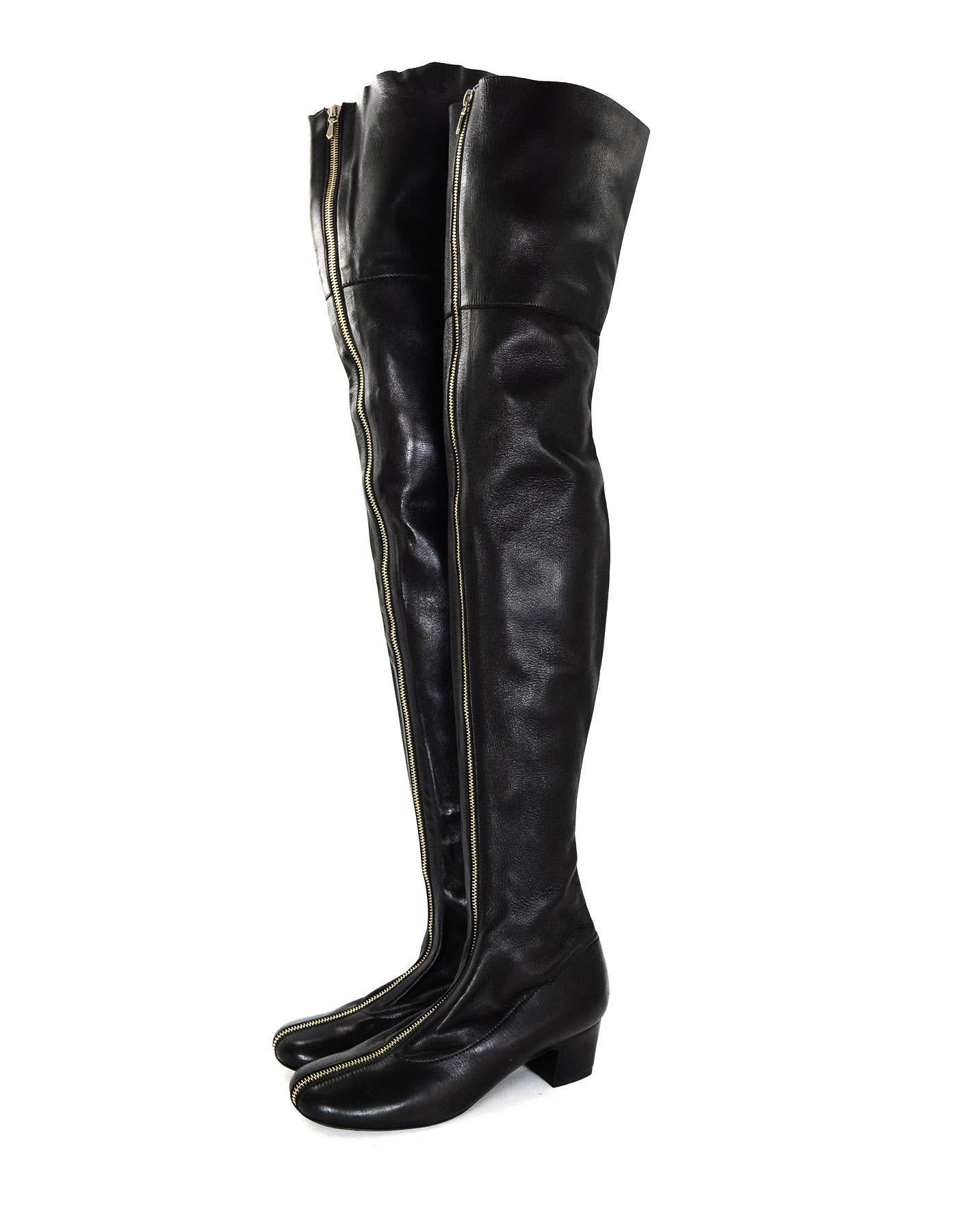 Chanel Black Over The Knee Goldtone Zipper Front Round Toe Boots Sz 6.5
**SOLD AS -IS- Please refer to the condition**

Made In: Italy
Color: Black
Hardware: Goldtone zipper
Materials: Leather 
Closure/Opening: Full front zipper
Overall Condition: