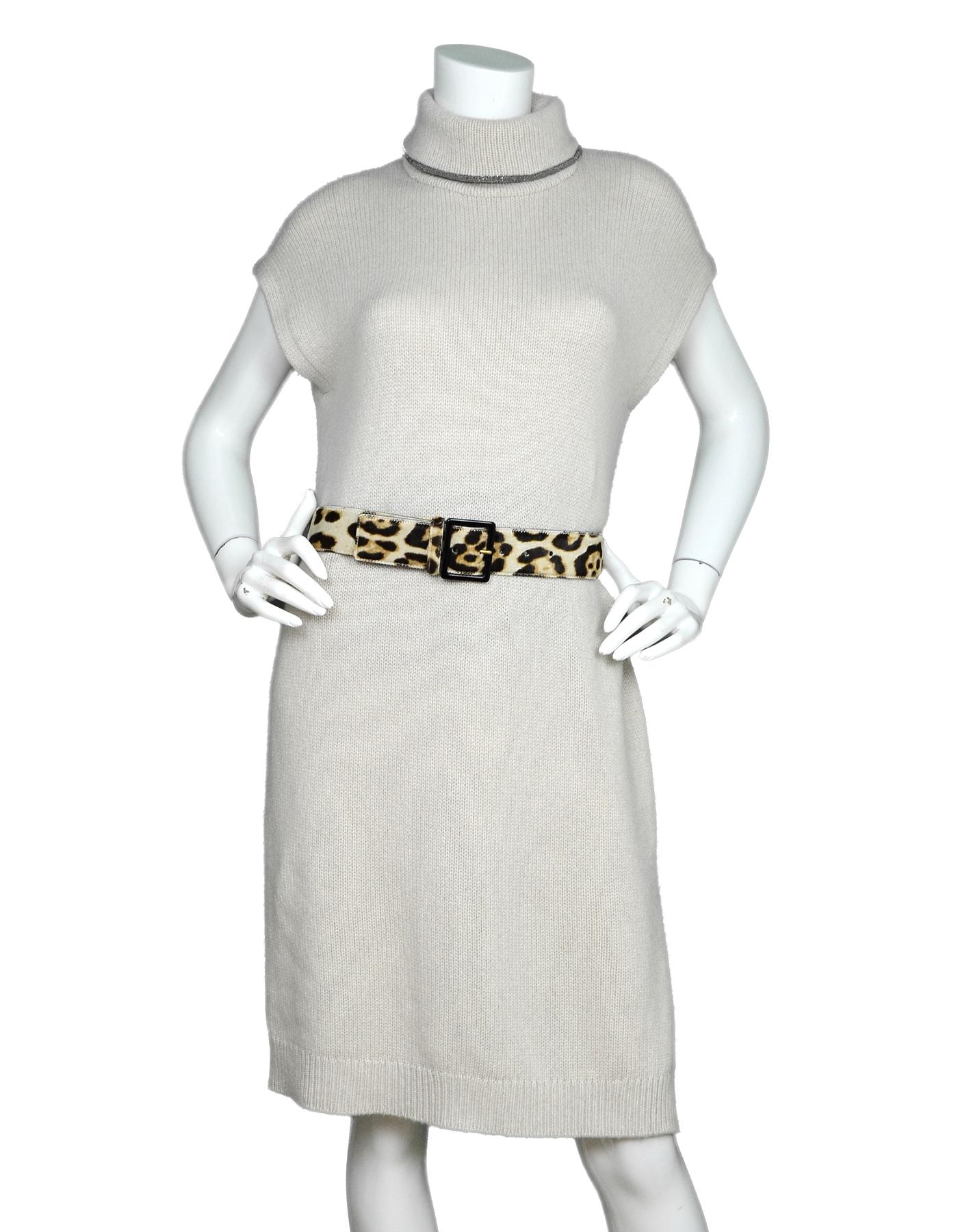 YSL Yves Saint Laurent Pony Hair Tan/Brown Leopard Print Belt Sz S.
Belt Only, Pictured With Brunello Cucinelli Cashmere Dress, Item #6527-20

Made In: Italy
Color: Tan/brown
Hardware: Black
Materials: Pony hair, leather and metal
Lining: Black
