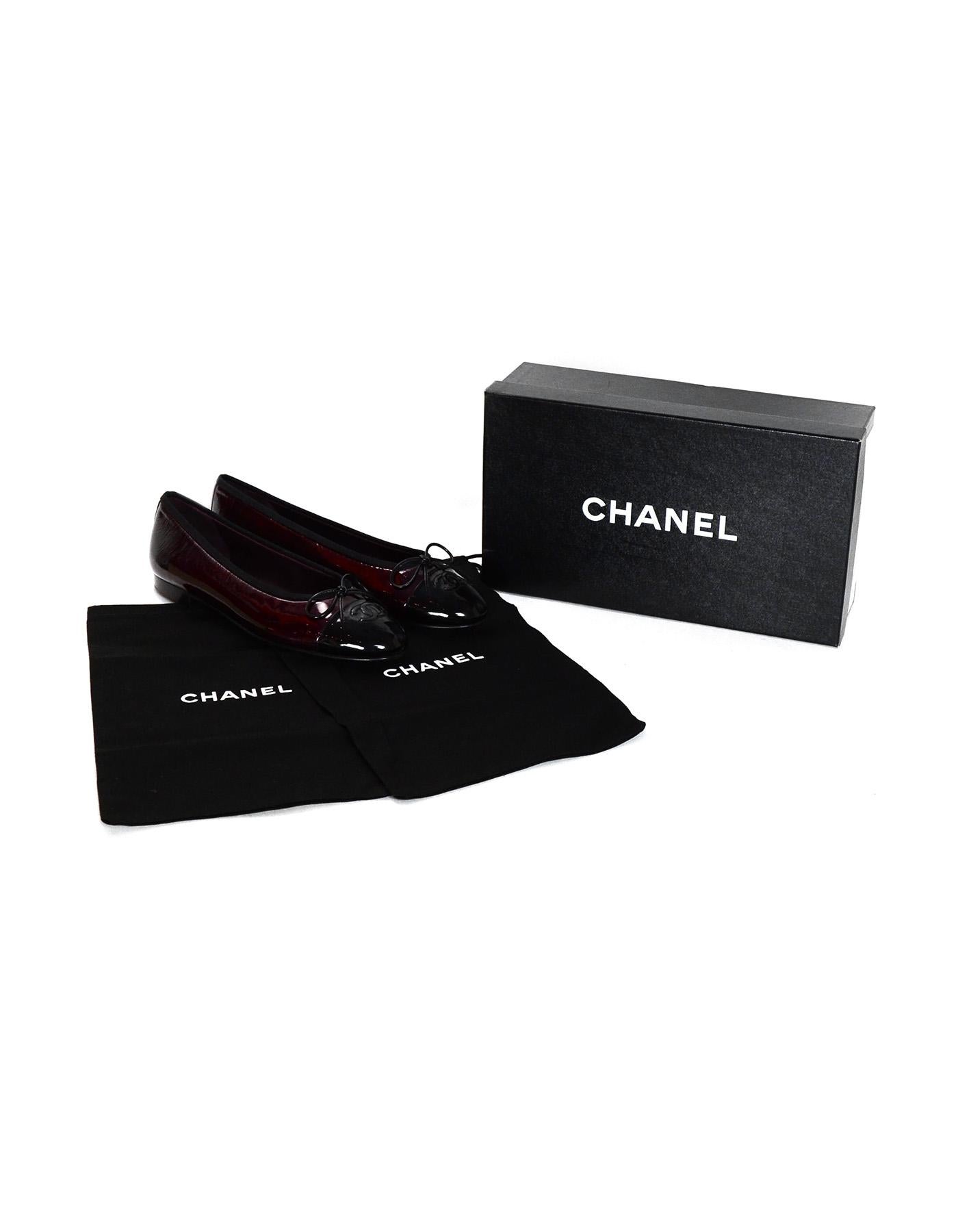 Chanel New Bordeaux/Black Patent Leather Cap Toe CC Ballet Flats Sz 38

Made In: Italy
Year of Production: 2008
Color: Bordeaux/black
Materials: Patent leather
Closure/Opening: Slide on
Overall Condition: Like new condition in original box
Retail: