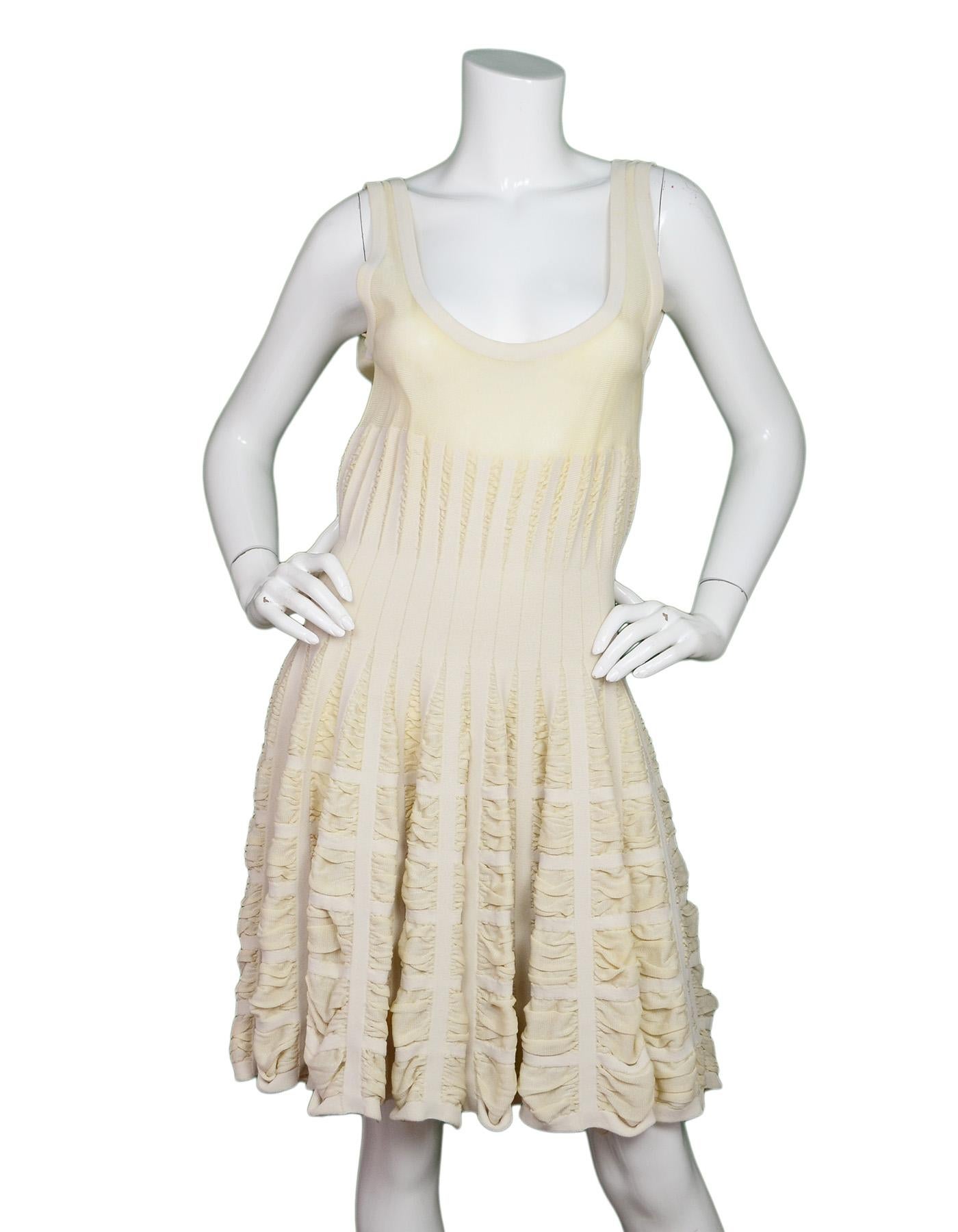 Alaia Cream Sleeveless Fit & Flare Dress Sz L

Made In: Italy
Color: Cream
Materials: 50% viscose, 40% silk, 10% polyester
Opening/Closure: Hidden back zipper
Overall Condition: Very good pre-owned condition with exception of some spoiling on straps