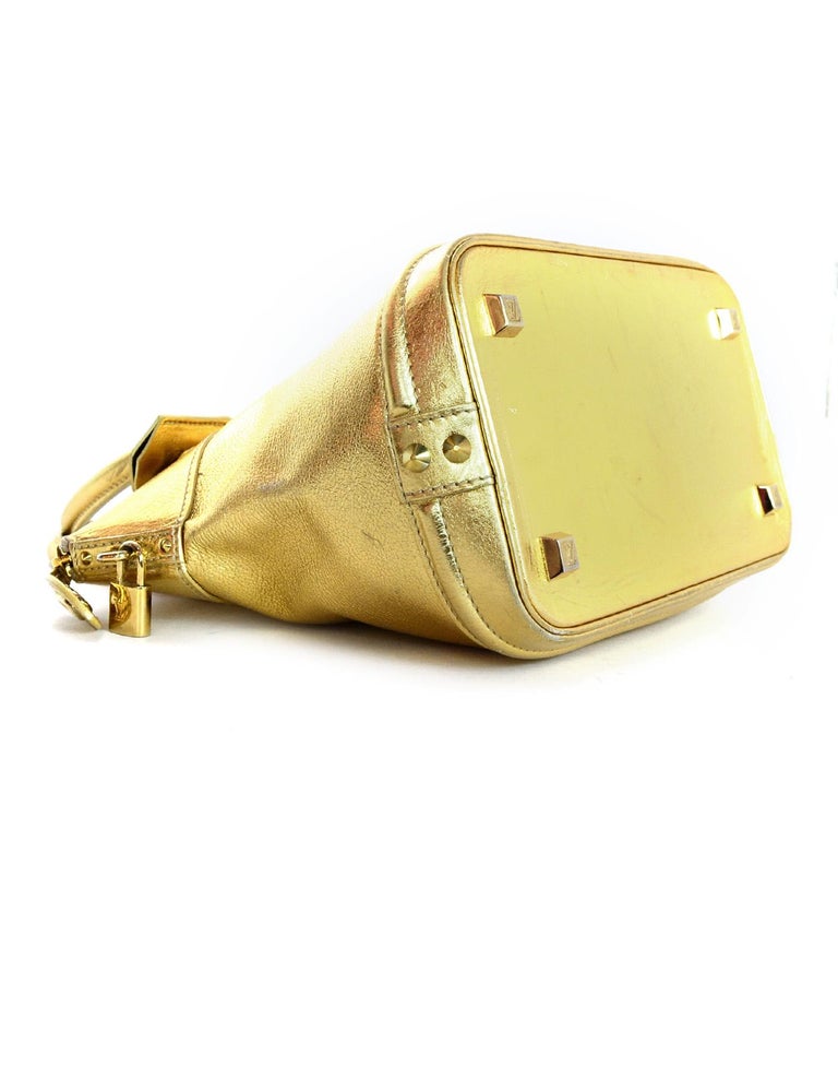 Louis Vuitton Gold Suhali Leather Lockit PM Bag W/ Lock/Keys/Clochette For Sale at 1stdibs