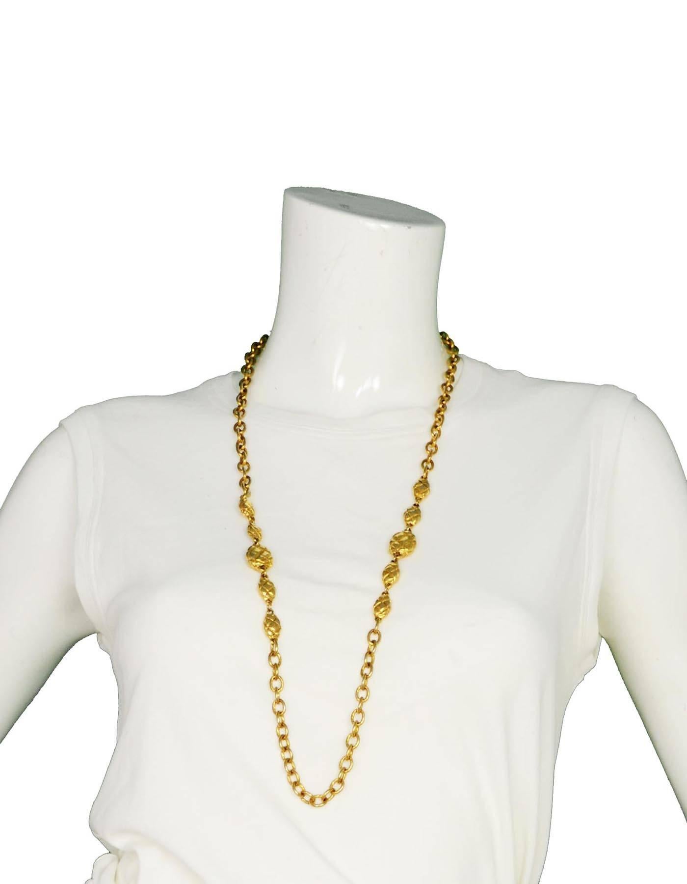 Women's CHANEL Vintage Gold Quilted Pendant Long Strand Necklace