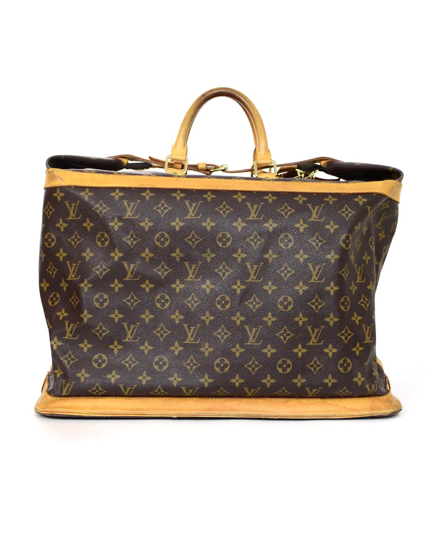 Louis Vuitton Brown Monogram LV Cruise Travel Duffle Bag Unisex

Made In: France
Year of Production: 2000
Color: Brown and tan 
Hardware: Goldtone
Materials: Coated canvas and leather
Lining: Brown canvas
Closure/Opening: Zip and belt buckle closure