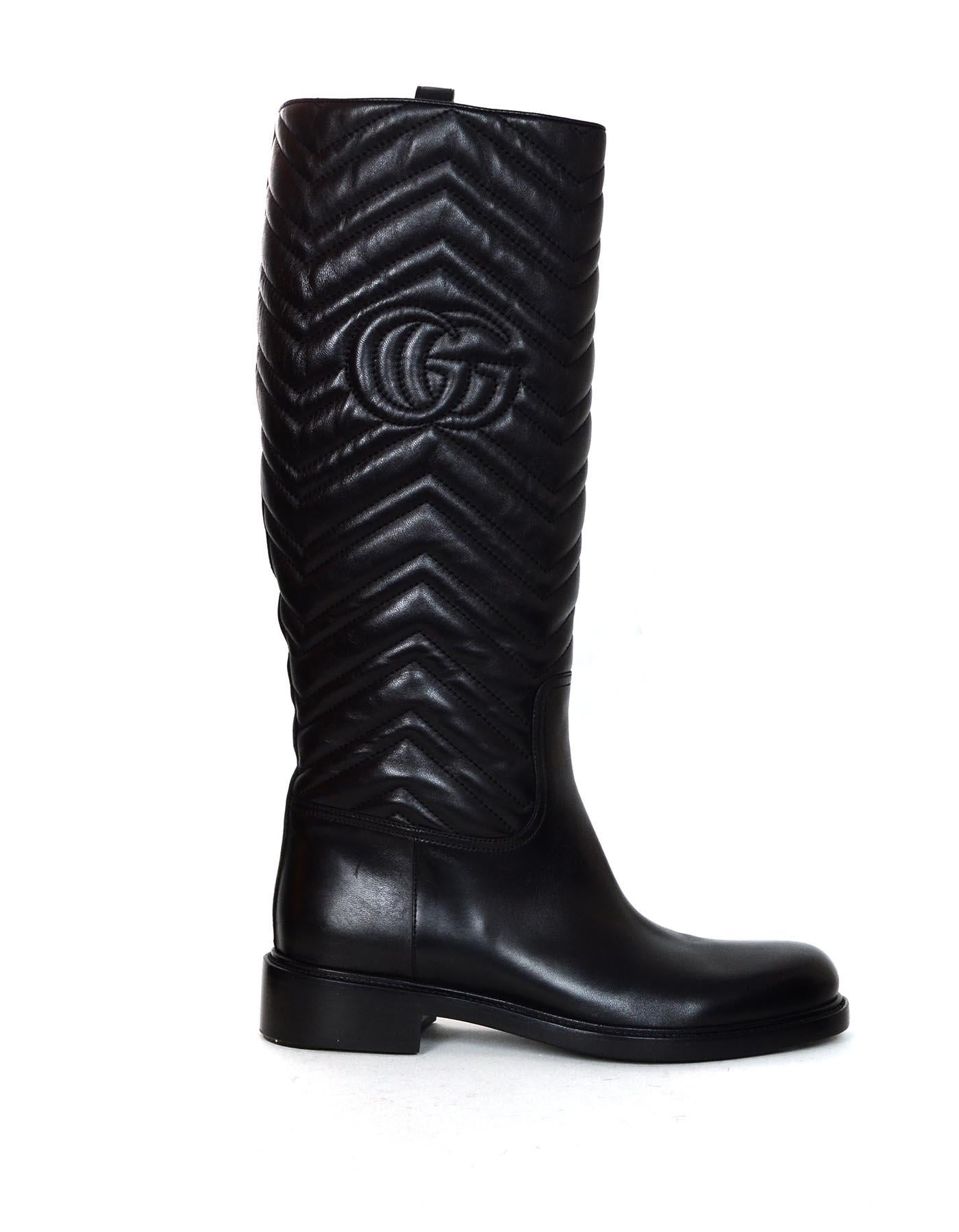 Gucci Black Matlasse Quilted Nappa Charlotte Knee High Riding Boots Sz 41 W/ Box

Made In: Italy
Year of Production: 
Color: Black
Materials: Nappa leather
Closure/Opening: Pull on
Overall Condition: Excellent pre-owned condition with minor