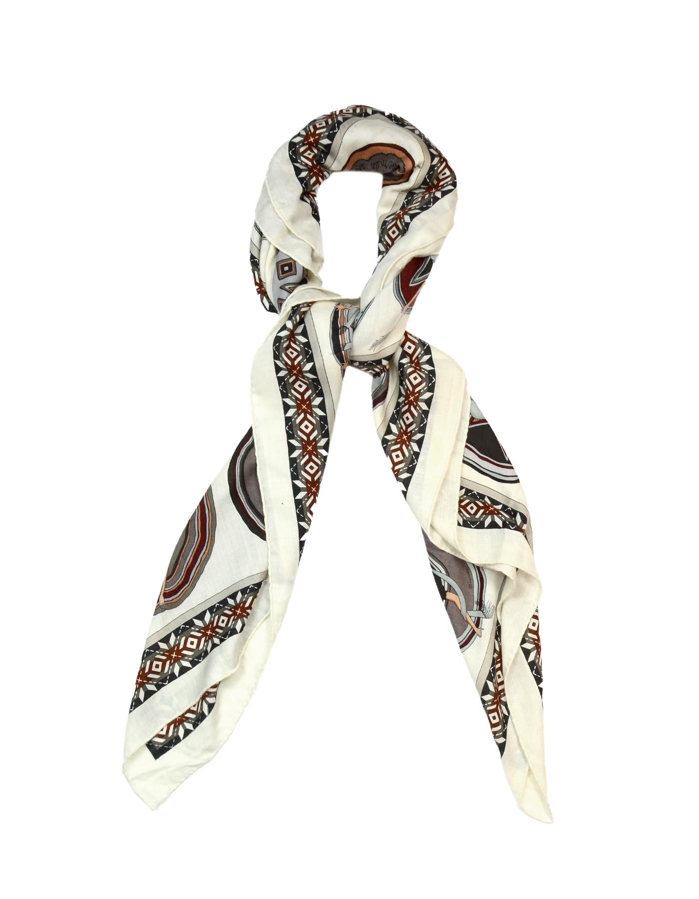 Hermes Ivory Belles Du Mexique Silk/Cashmere 140 Shawl

Made In:  France
Color: Ivory, grey, brown
Materials: Silk, cashmere (no composition tag)
Overall Condition: Good pre-owned condition with exception of some pulls in the fabric
Estimated