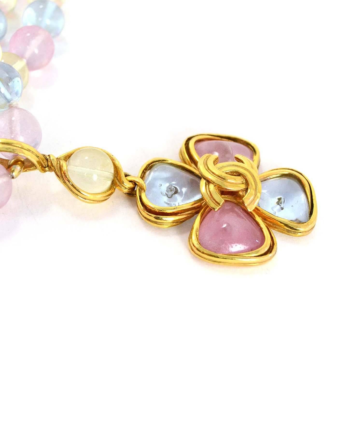 Chanel Vintage '96 Lavender & Pink Glass Bead Flower Necklace
Features goldtone CC twist lock back neck closure
Made in: France
Year of Production: 1996
Stamp: 96 CC P
Closure: CC twist lock closure
Color: Goldtone, pink, lavender, and