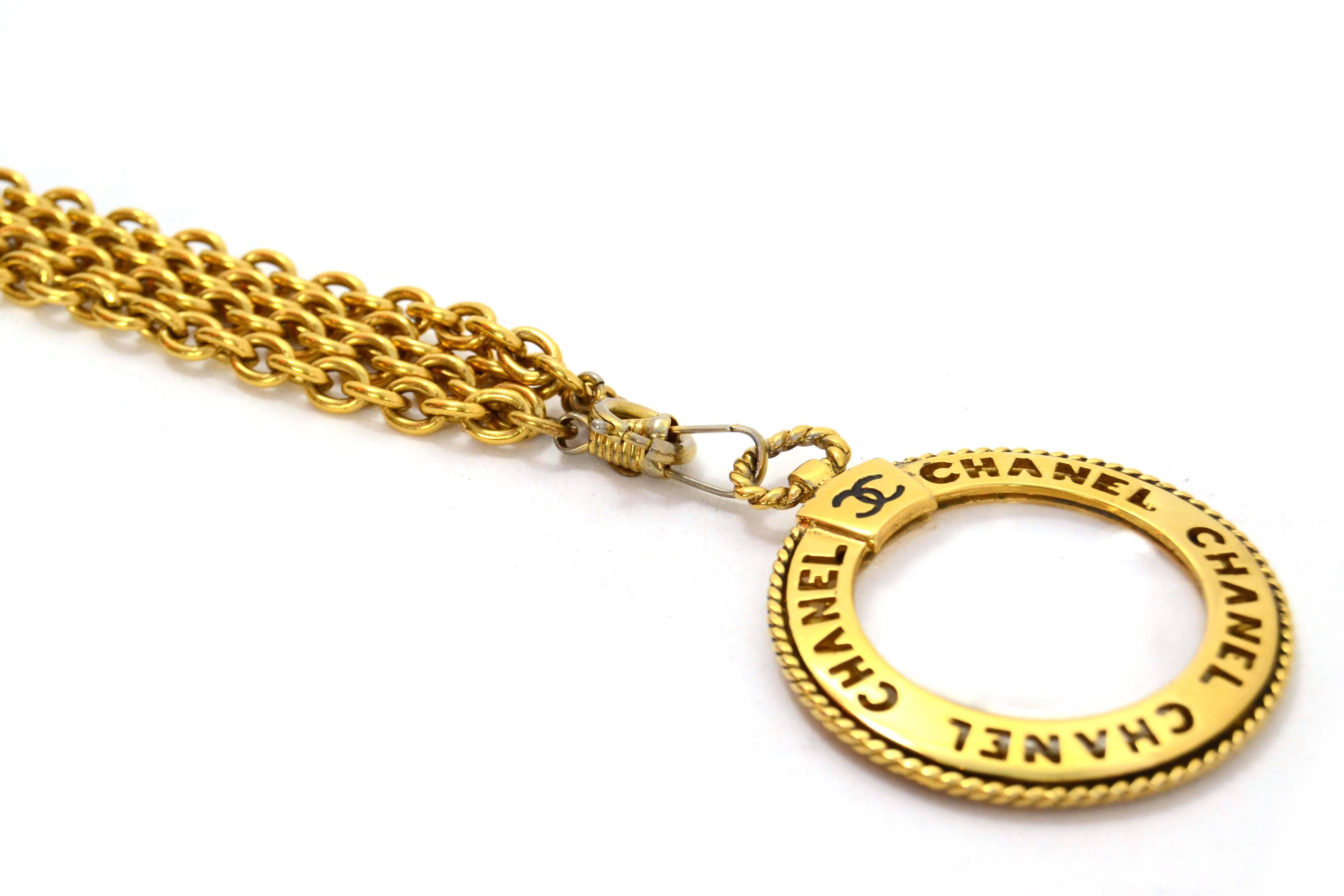Chanel Vintage ‘70s-‘80s Double Chain Link Magnifying Glass Necklace
Features CC and Chanel etched out around magnifying glass pendant
Made In: France
Year of Production: 1970’s-1980’s
Color: Goldtone
Materials: Metal and glass
Closure: Front