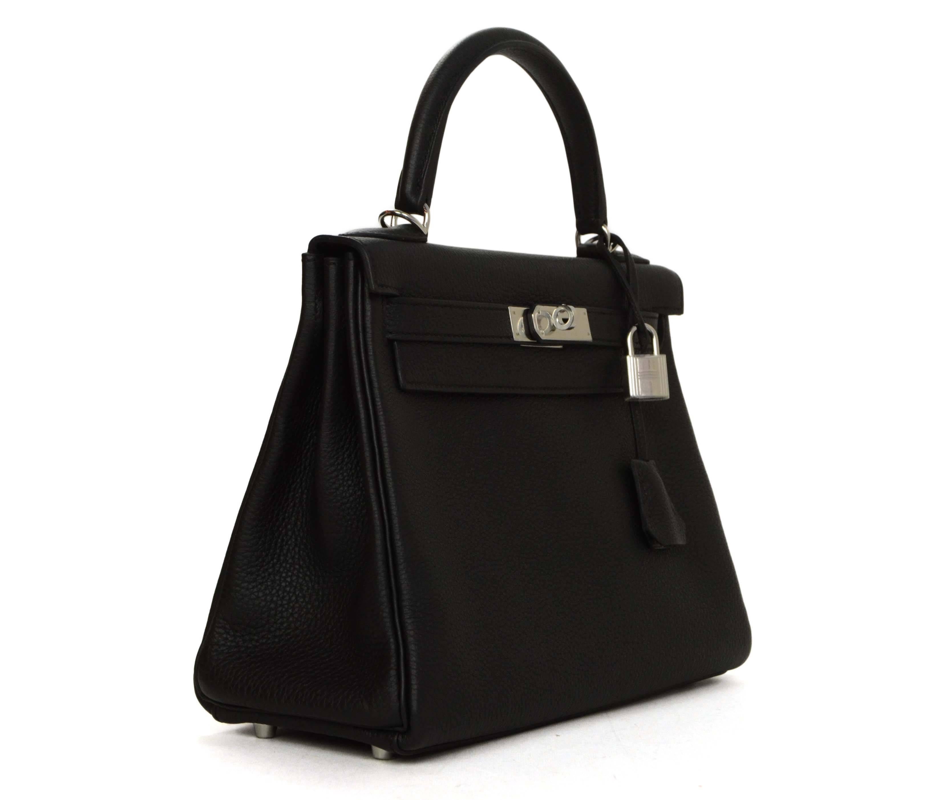 Hermes Black Togo 28cm Kelly Bag 
Features detachable shoulder strap
Made In: France
Year of Production: 2014
Color: Black and silvertone
Hardware: Palladium
Materials: Togo leather and metal
Lining: Black chevre leather
Closure/Opening: