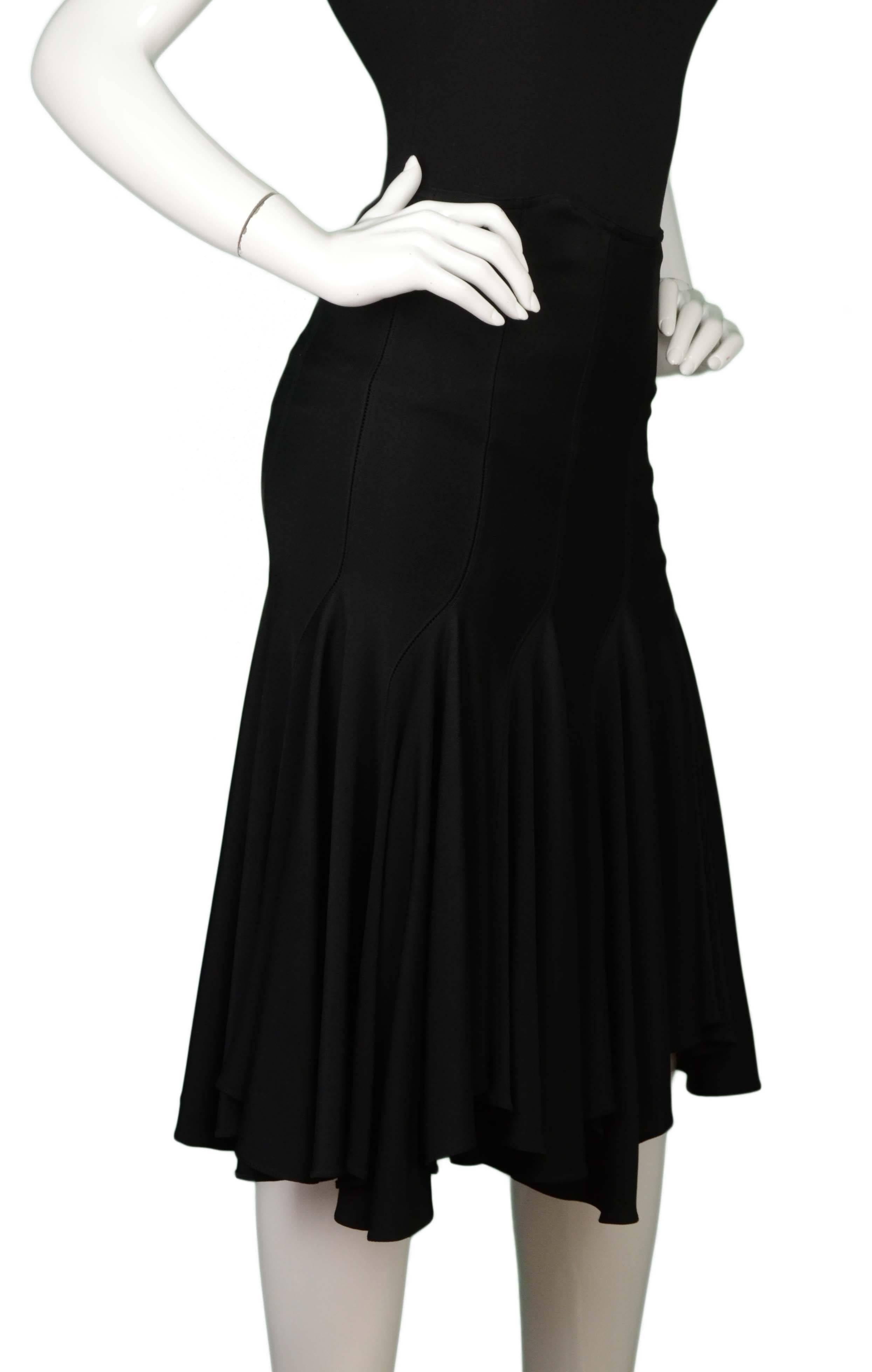 Alaia Black Trumpet Skirt
Features bias cut
Made In: Italy
Color: Black
Composition: 100% viscose
Lining: None
Closure/Opening: Back center zipper with hook and eye closure
Exterior Pockets: None
Interior Pockets: None
Overall Condition: