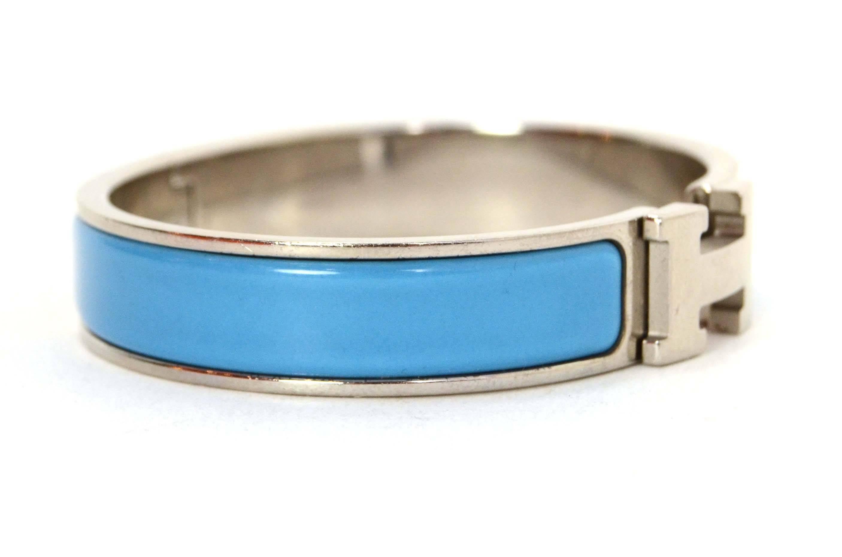 Hermes Narrow Turquoise Enamel H Clic Clac Bangle
-Made In: France
-Color: Turquoise and silvertone
-Materials: Enamel and palladium
-Closure: Hinge with H swivel to secure closure
-Stamp: Hermes 0 Made in France
-Overall Condition: Excellent