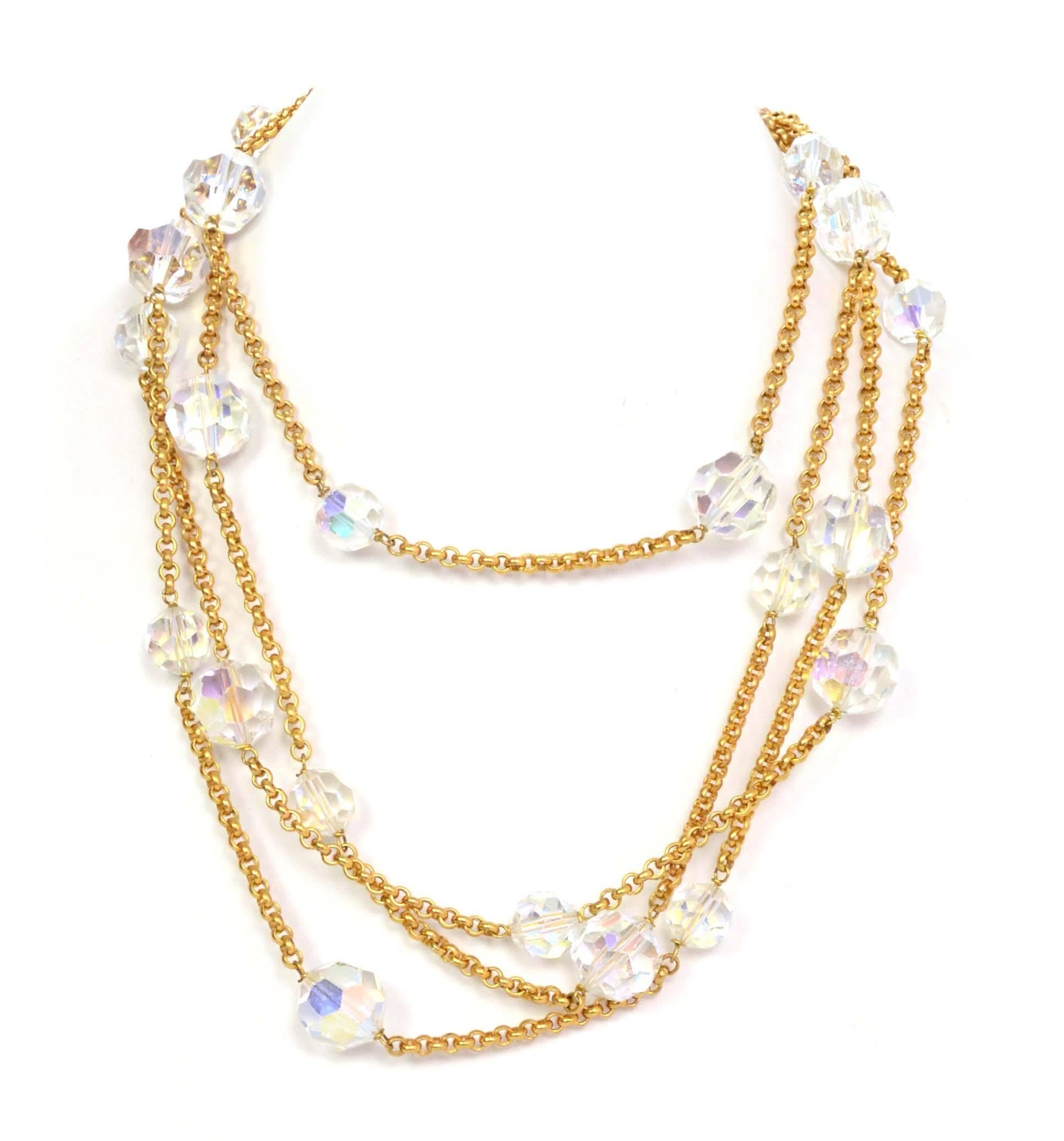 Chanel Vintage '88 Gold Chain Link Crystal Beaded Long Necklace 
Features graduated crystal beads

Made In: France
Year of Production: 1988
Color: Goldtone and clear iridescent
Materials: Crystal beads and metal
Closure: Lobster claw